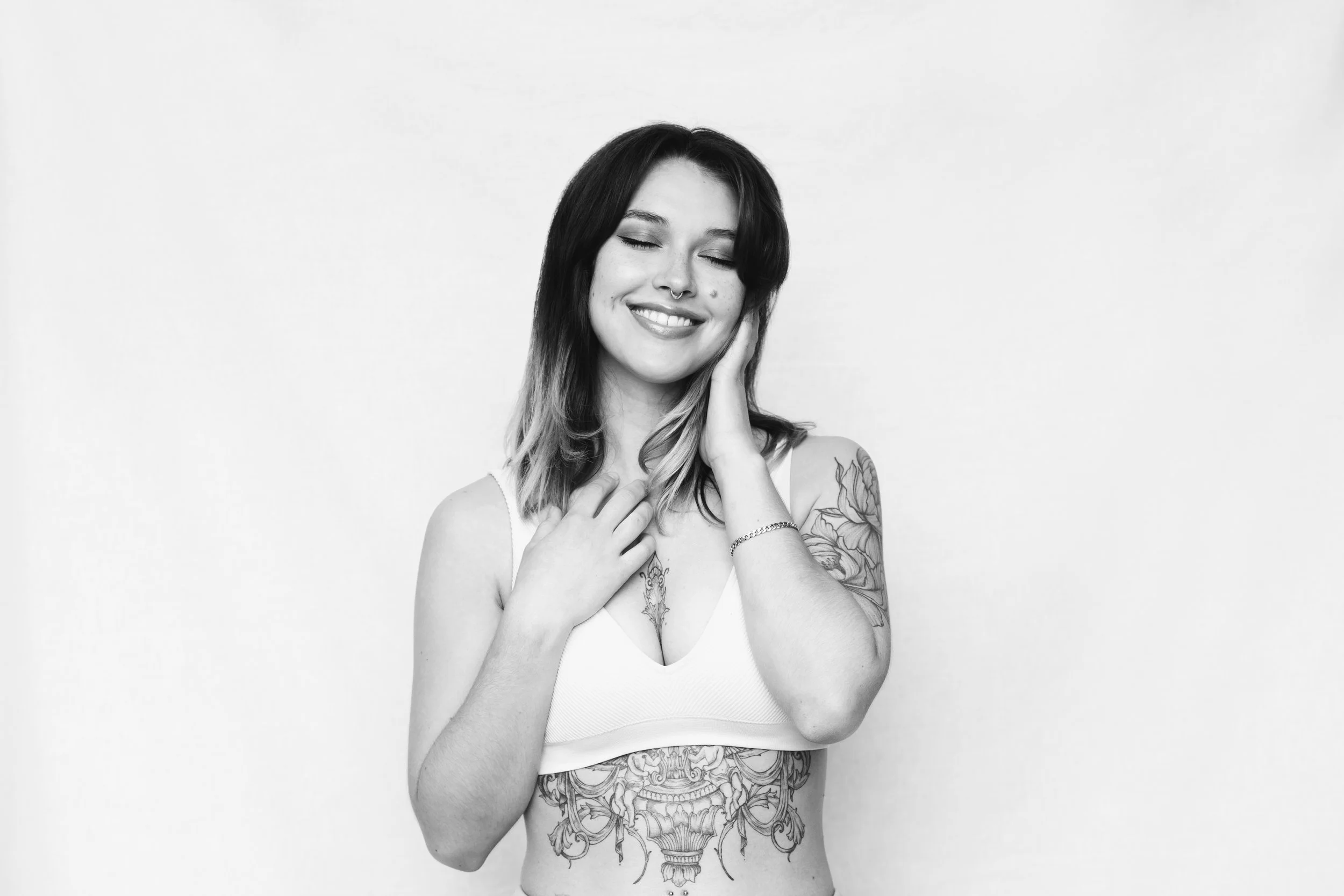 Smiling picture made for my social profiles with a smile, tattoos and septum piercing