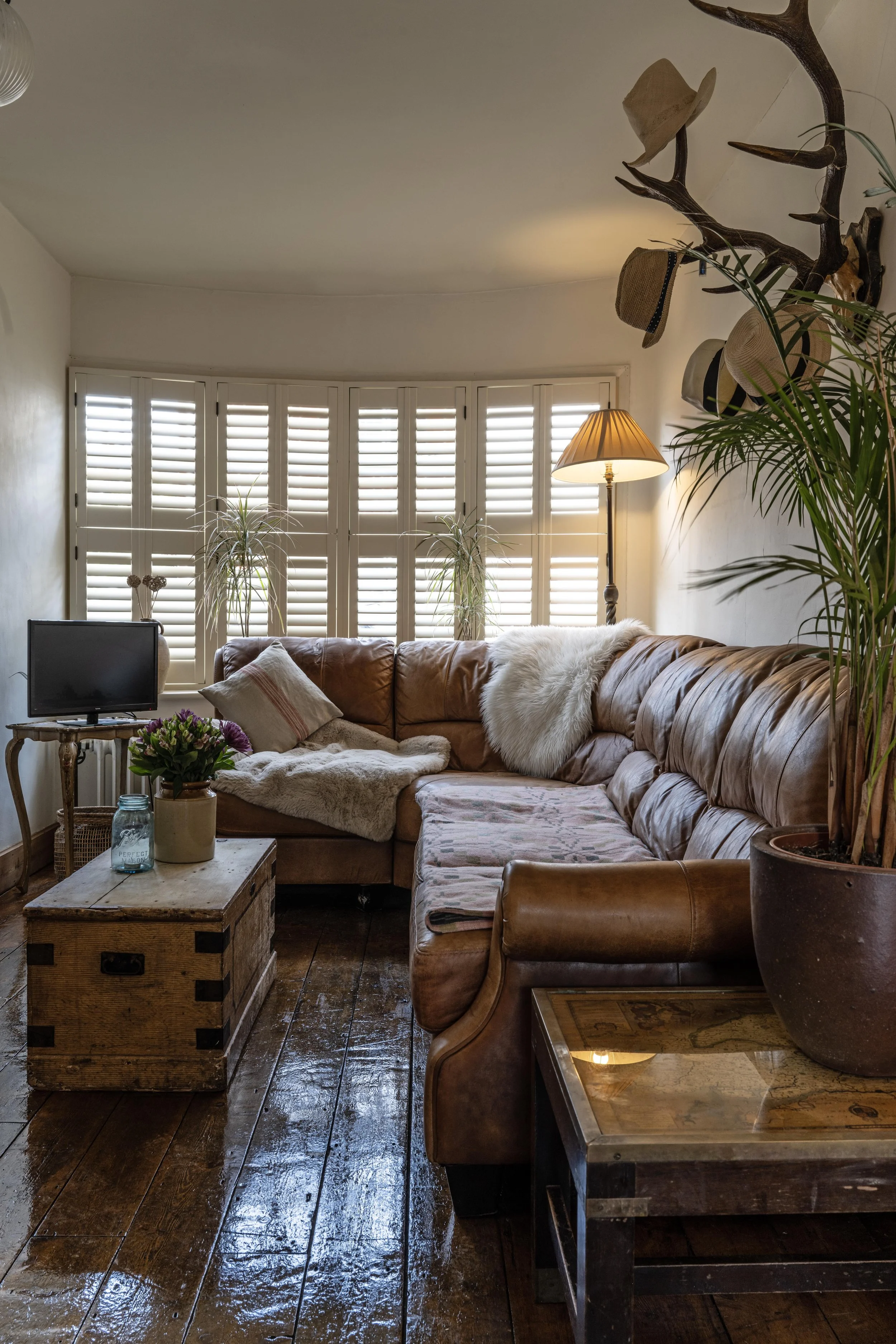 We have two large, comfy vintage sofas that seat six people comfortably. 