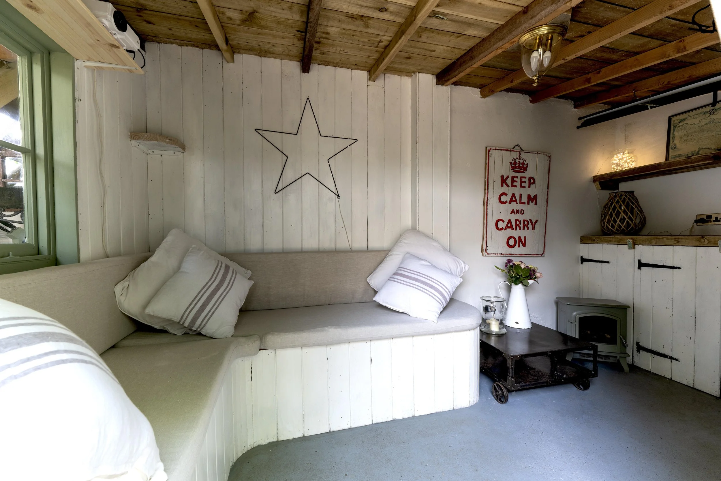 In the garden there is a separate garden room for guests to use which has bespoke seating, a fire and a cinema projector and screen. 