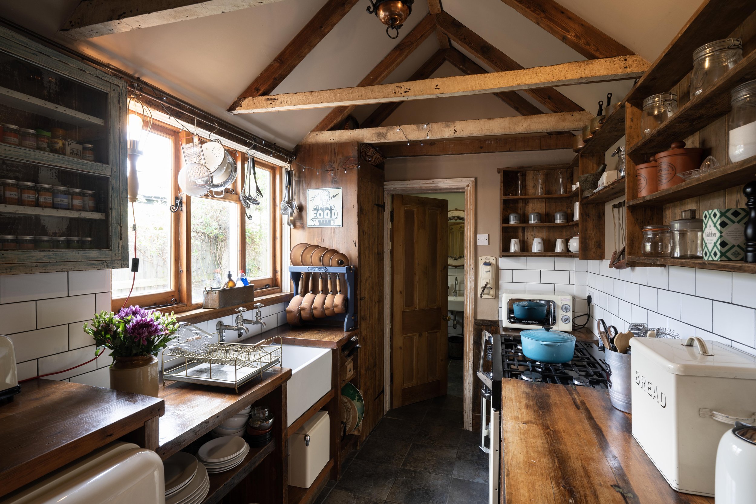 Our fully equipped kitchen has the original vaulted ceilings, butler sink, wooden beams and hand built wooden worktops. 