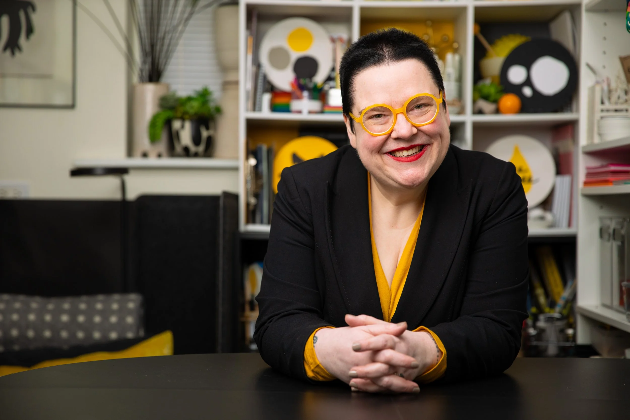 portrait of a woman at a desk