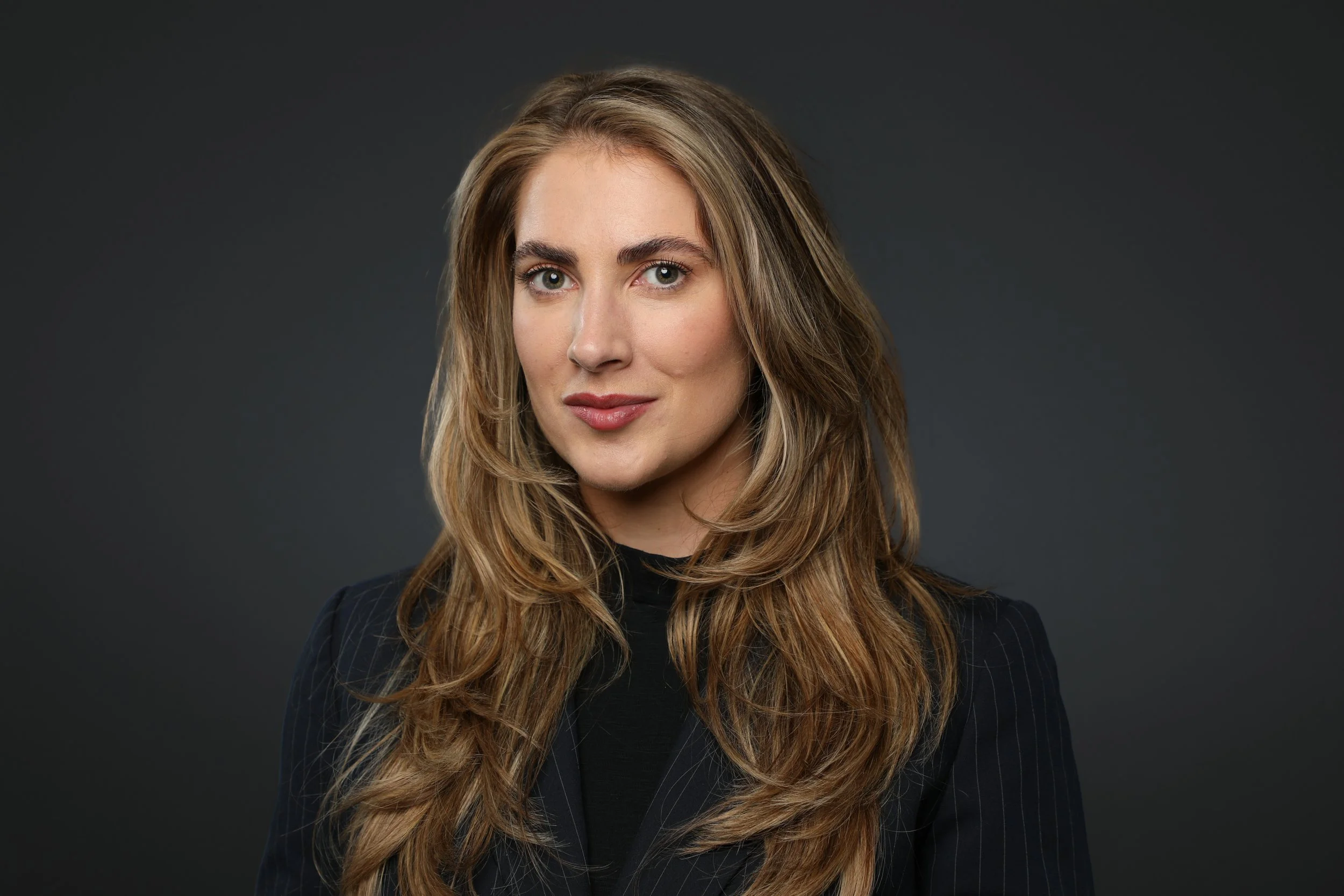 headshot of a woman with a soft smile