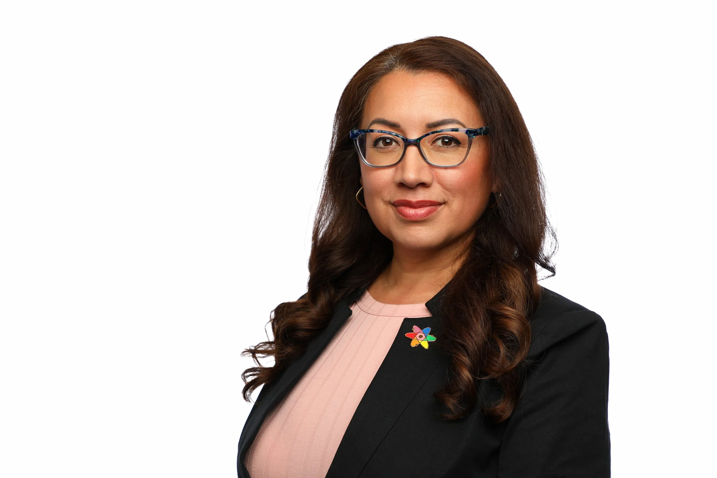 headshot of a woman in front of a white background