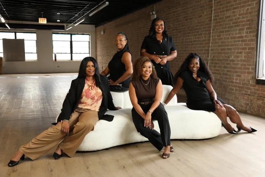 group photo of five women