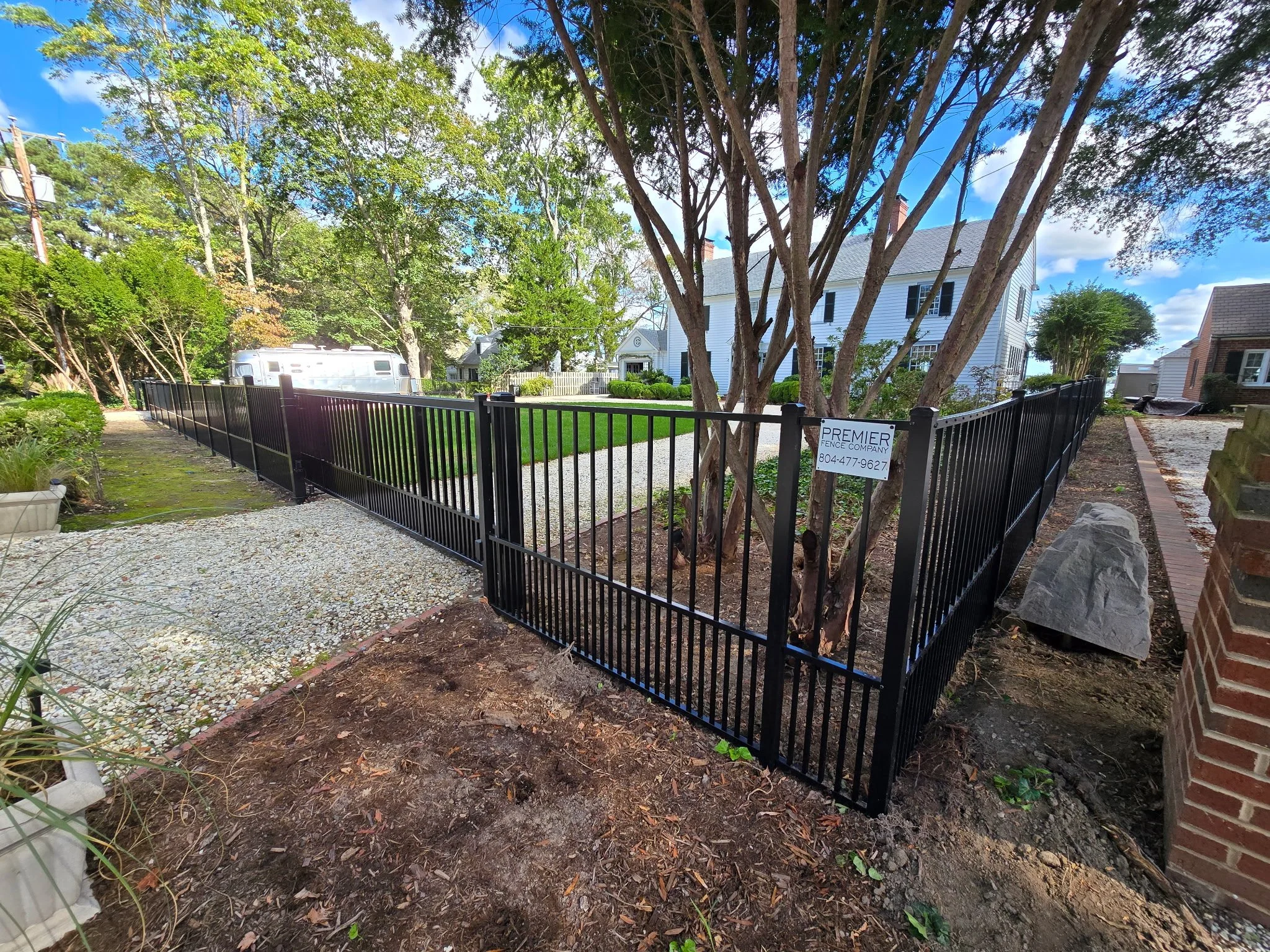 Custom aluminum automatic gate over driveway