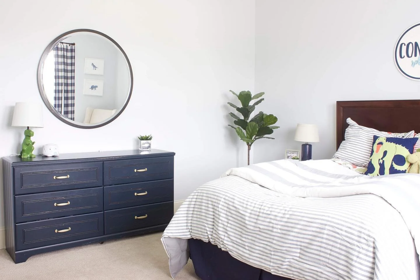 A good night's sleep for the budding paleontologist. Designing kids' rooms is so fun - it's a balance of function/storage, their favorite things 🦖, and design to grow with. 

#charlotteinteriors #cltinteriors #bigboyroom #dinosaurroom #virtualinteri