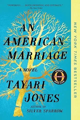 Book cover of 'An American Marriage' by Tayari Jones featuring a large, yellow tree with bare branches against a blue background.