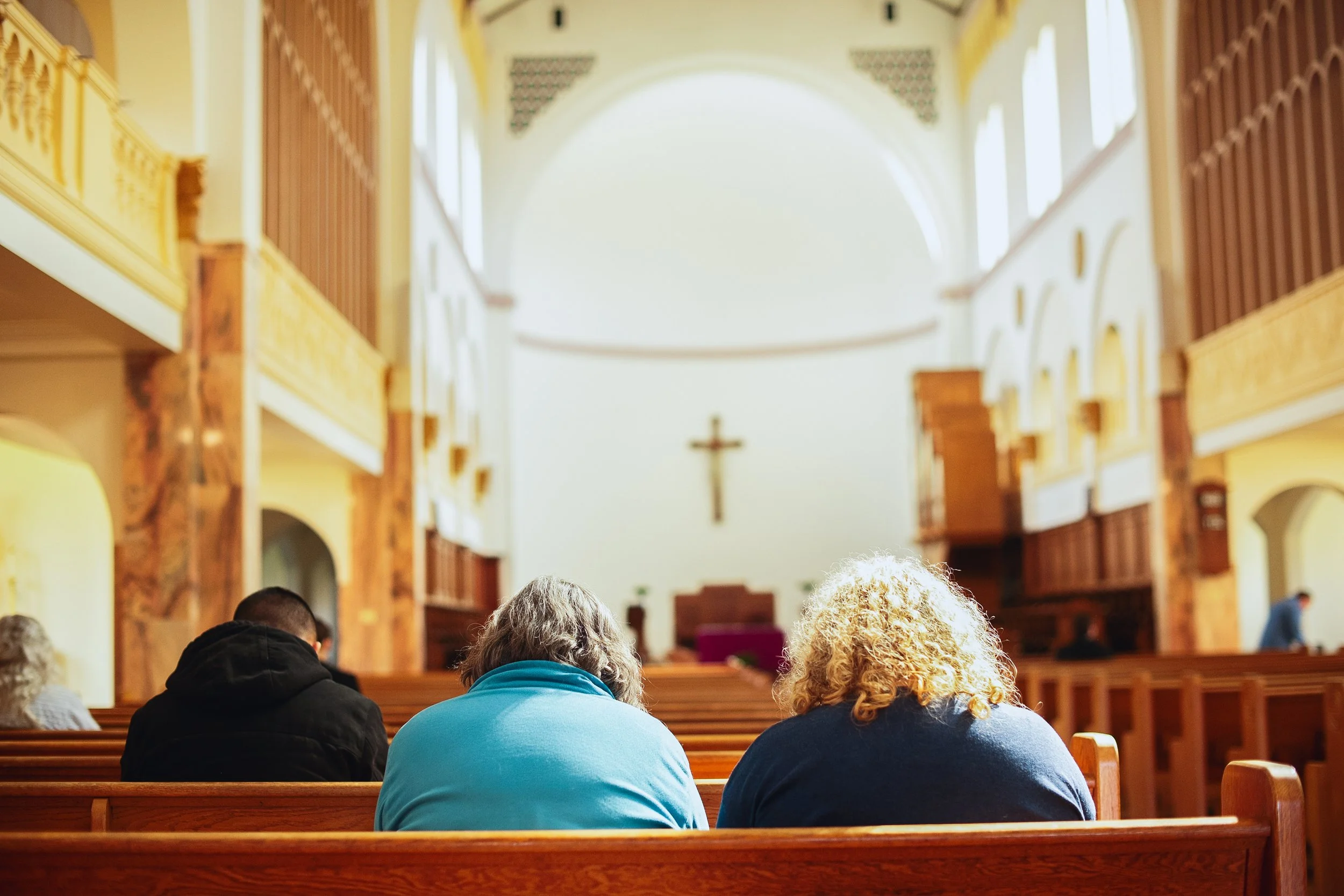 People praying at Shalom Collective retreat