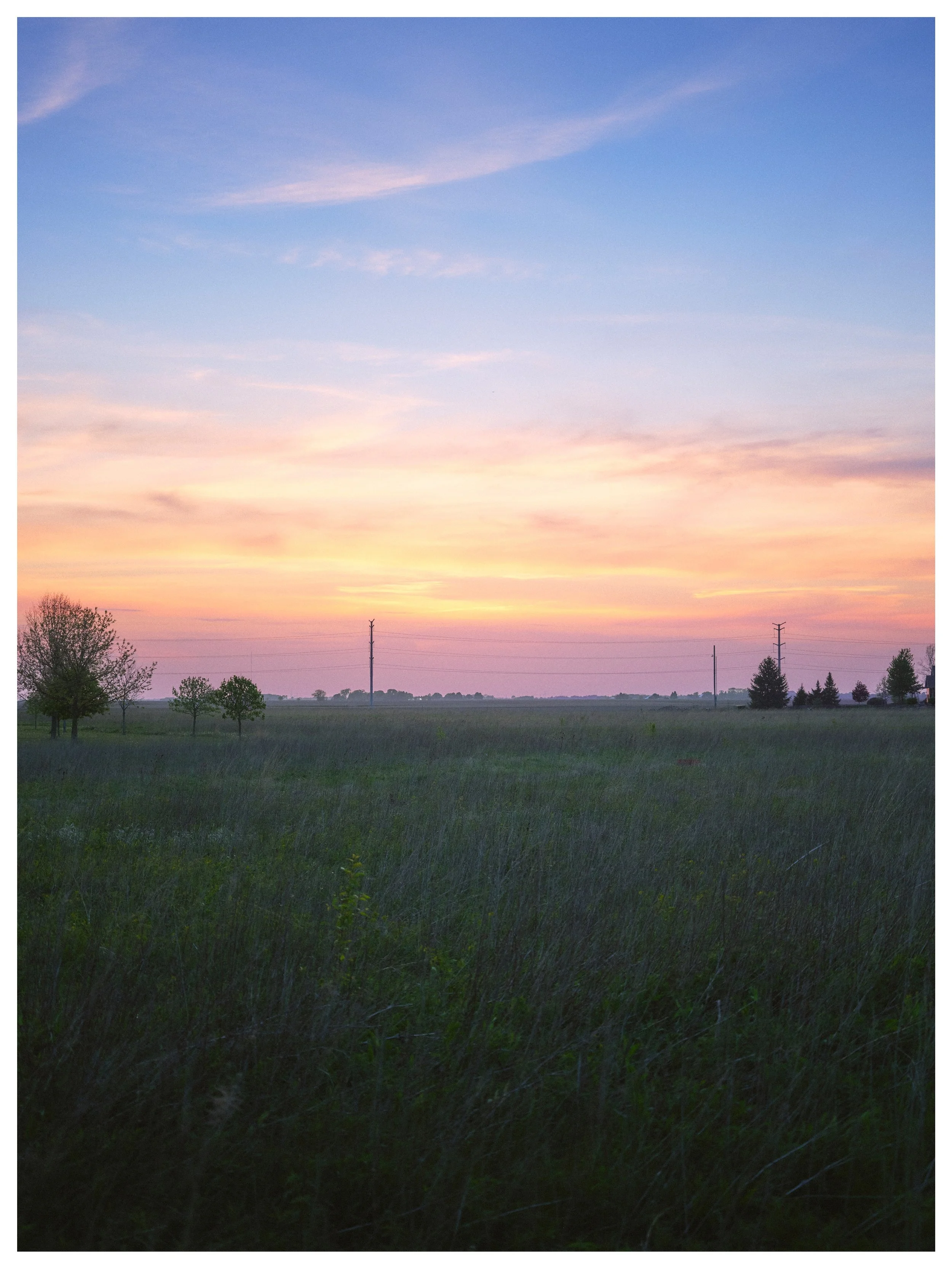 A peaceful evening 

Champaign, Illinois 
April | 2026
📸 GFX 100s

Walking around a little park, watching a beautiful midwest sunset in Champaign, Illinois while visiting family last month. The PNW gets it&rsquo;s fair share of stunning sunset, but 