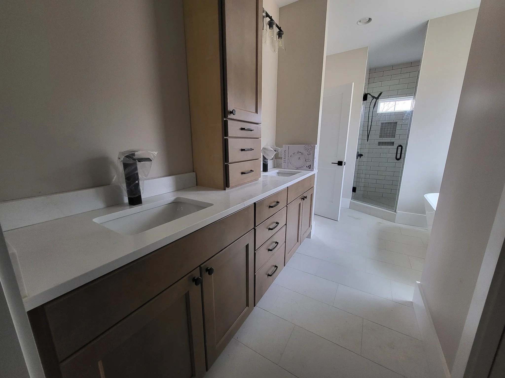 bathroom cabinet install, door installation, trim work