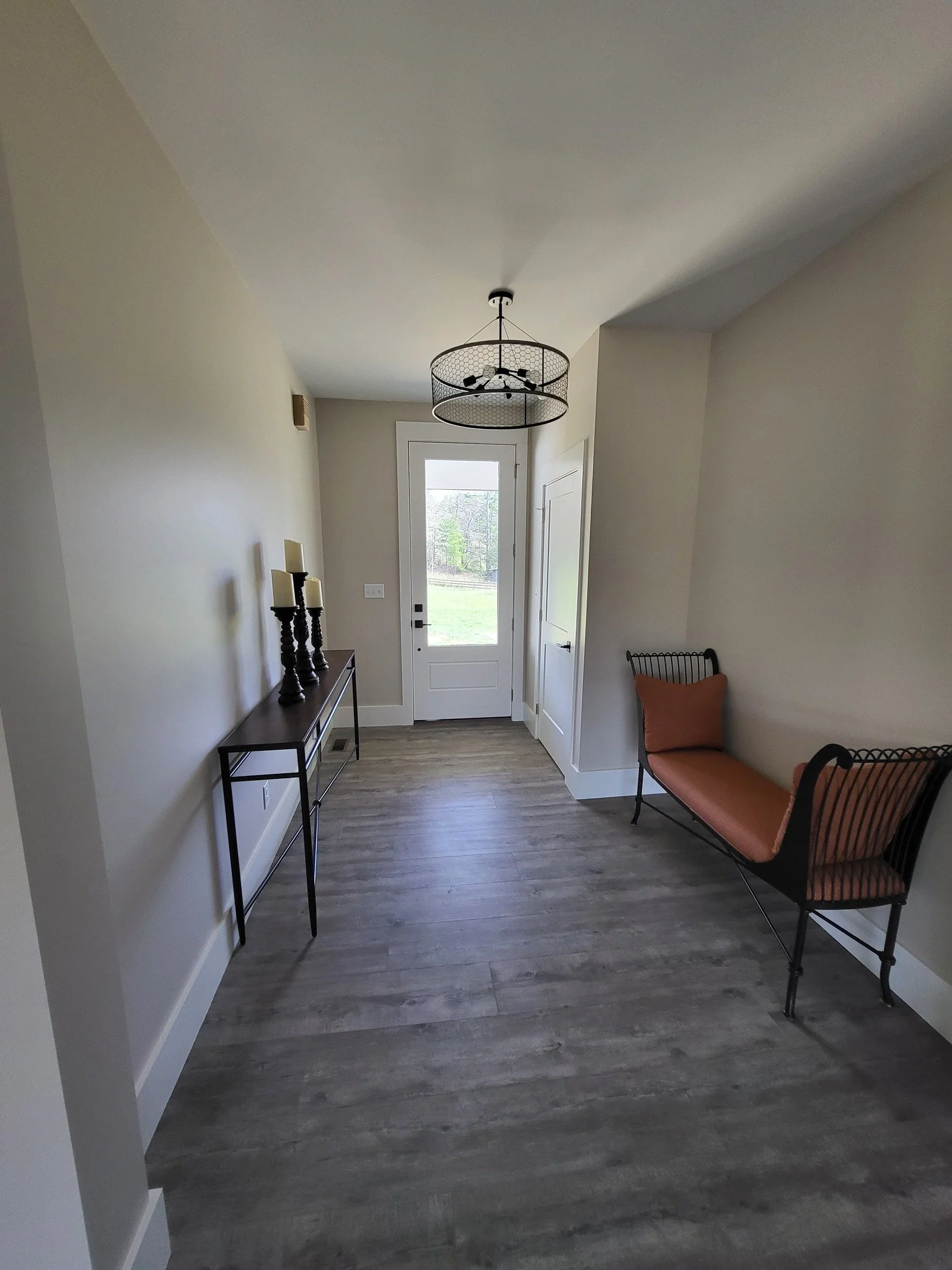 entryway hallway trim baseboard front door.jpg