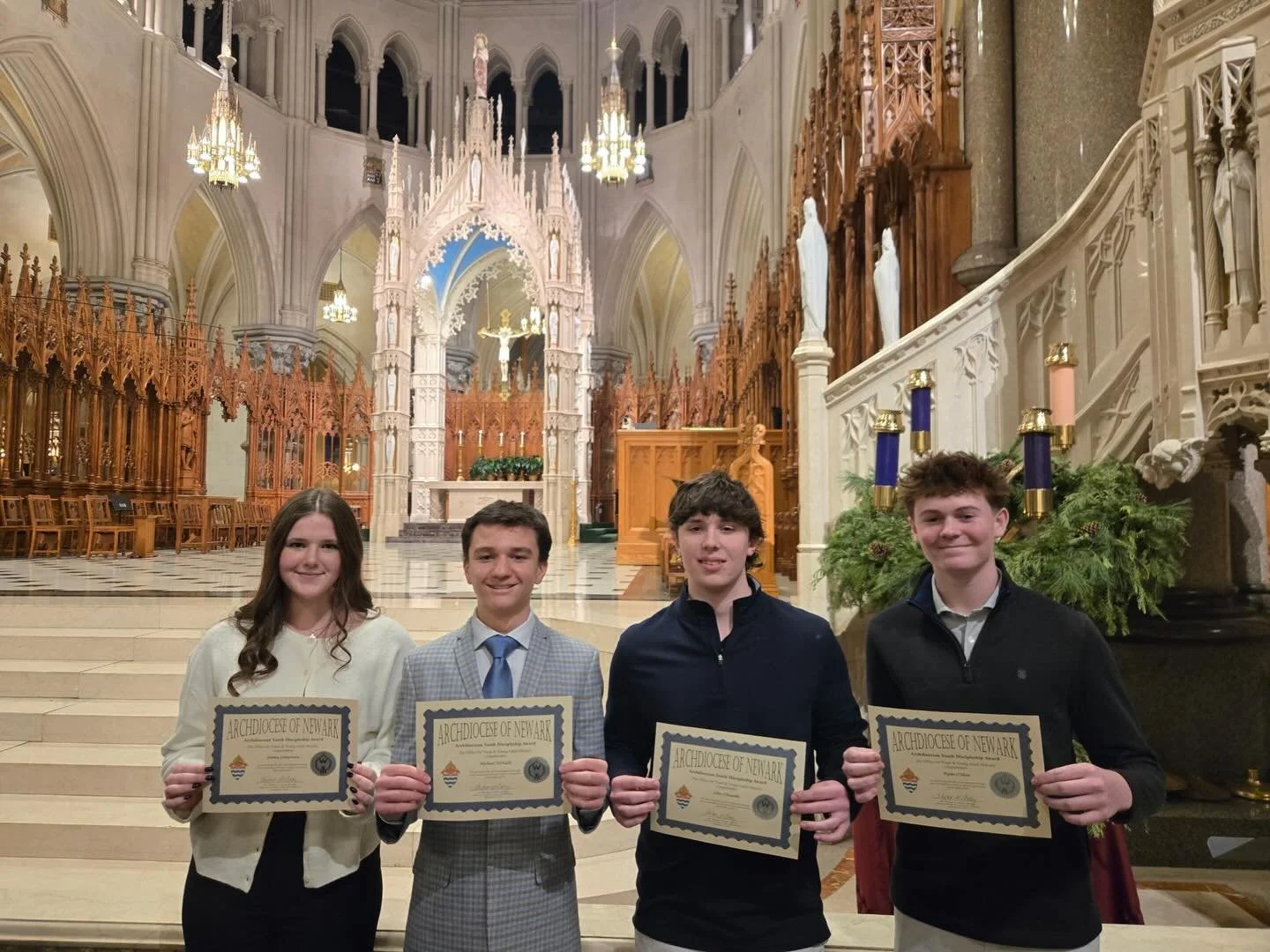 On Sunday, December 7th, four of our high school students were recognized at the Cathedral Basilica of the Sacred Heart for their outstanding service to the Church at the Youth Discipleship Award Ceremony presided over by Cardinal Tobin. 

Our four r