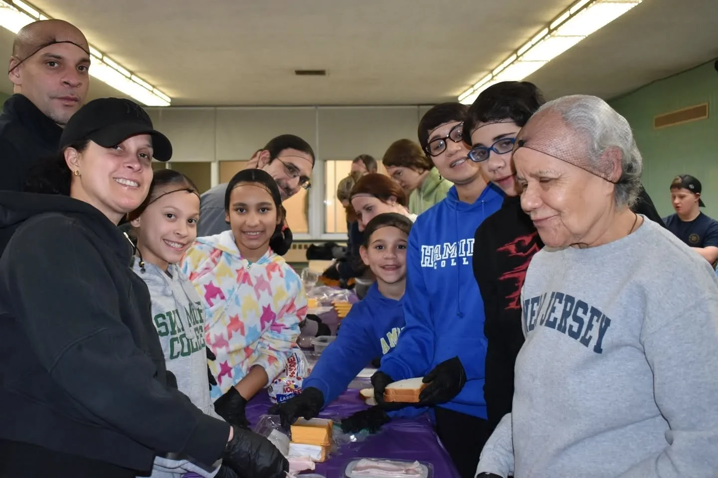 This evening, the spirit of St. Peter's filled the gym as over 100 parishioners participated in Feed Thy Neighbor, our first of weekly Lenten service projects focused on various Corporal Works of Mercy &mdash; the theme of our Lent this year.

Equipp