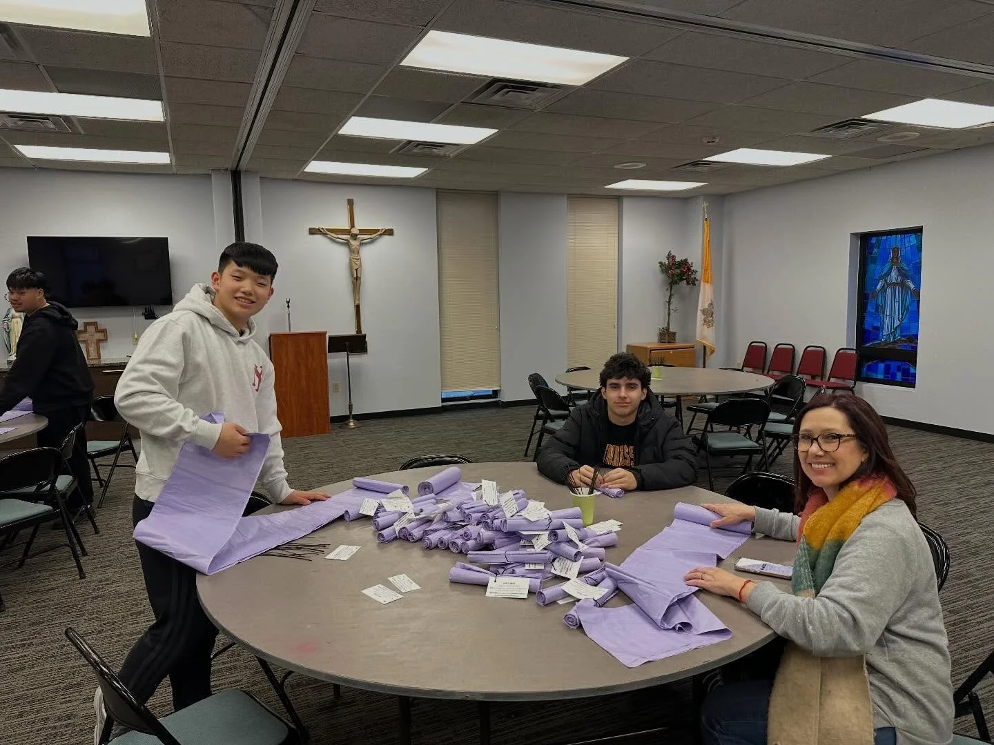 This weekend, 400 purple garbage bags were handed out after the Masses for parishioners to take home and fill up with gently used clothes. 

Once full, all are encouraged to bring the bags to the Catholic Charities bins at the edge of the parking lot