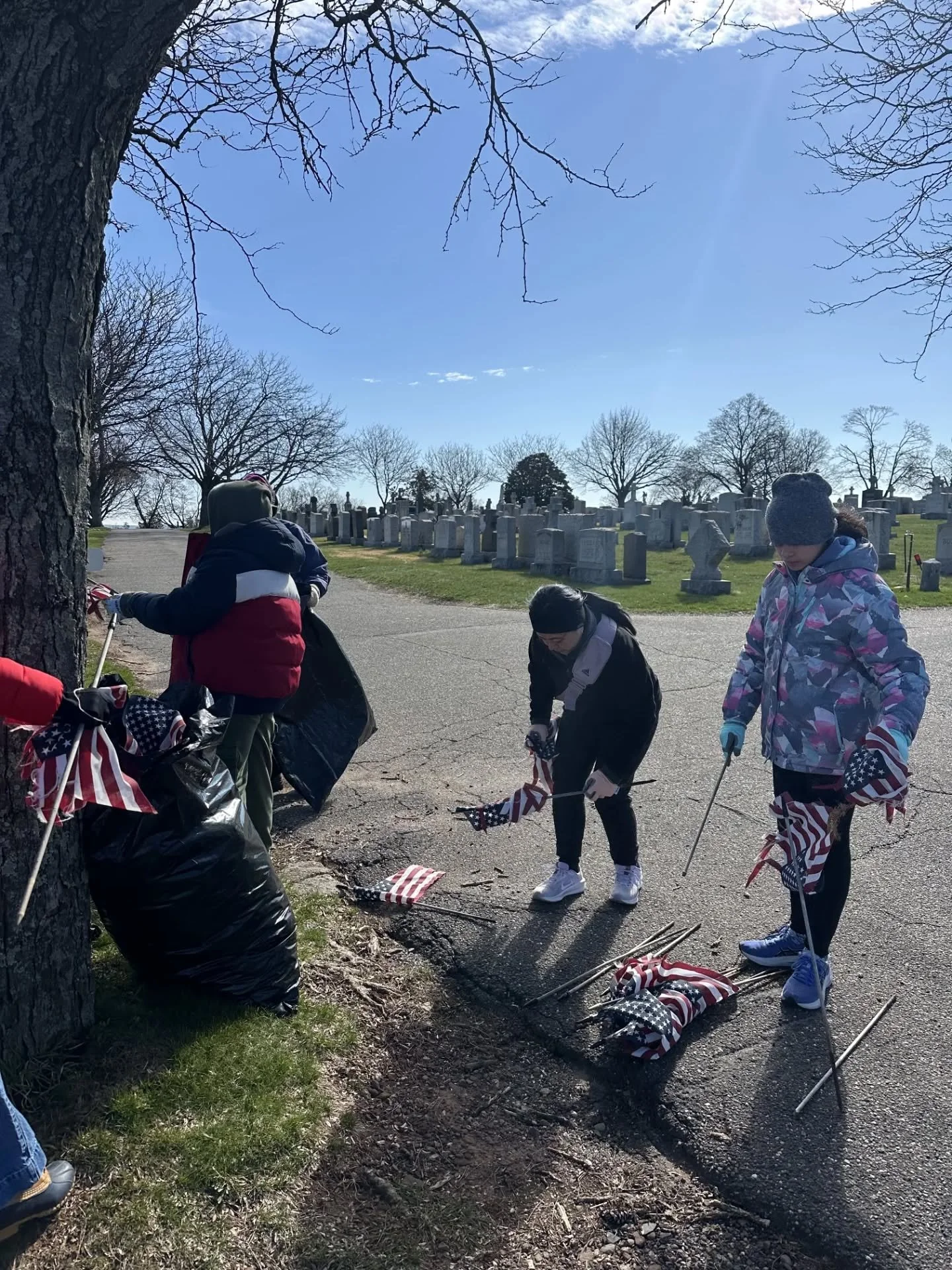 On this chilly spring Saturday morning, about 20 volunteers from our parish came together to care for a cemetery, living out this week&rsquo;s Corporal Work of Mercy: to bury the dead.

They replaced worn flags, restored neglected areas, and worked d