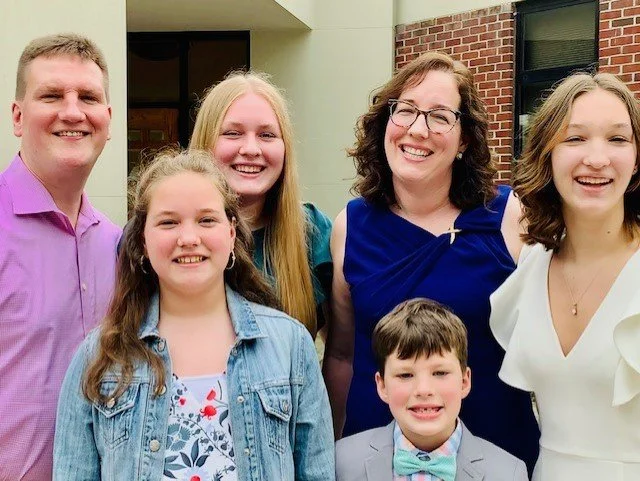 Lukich family outside church