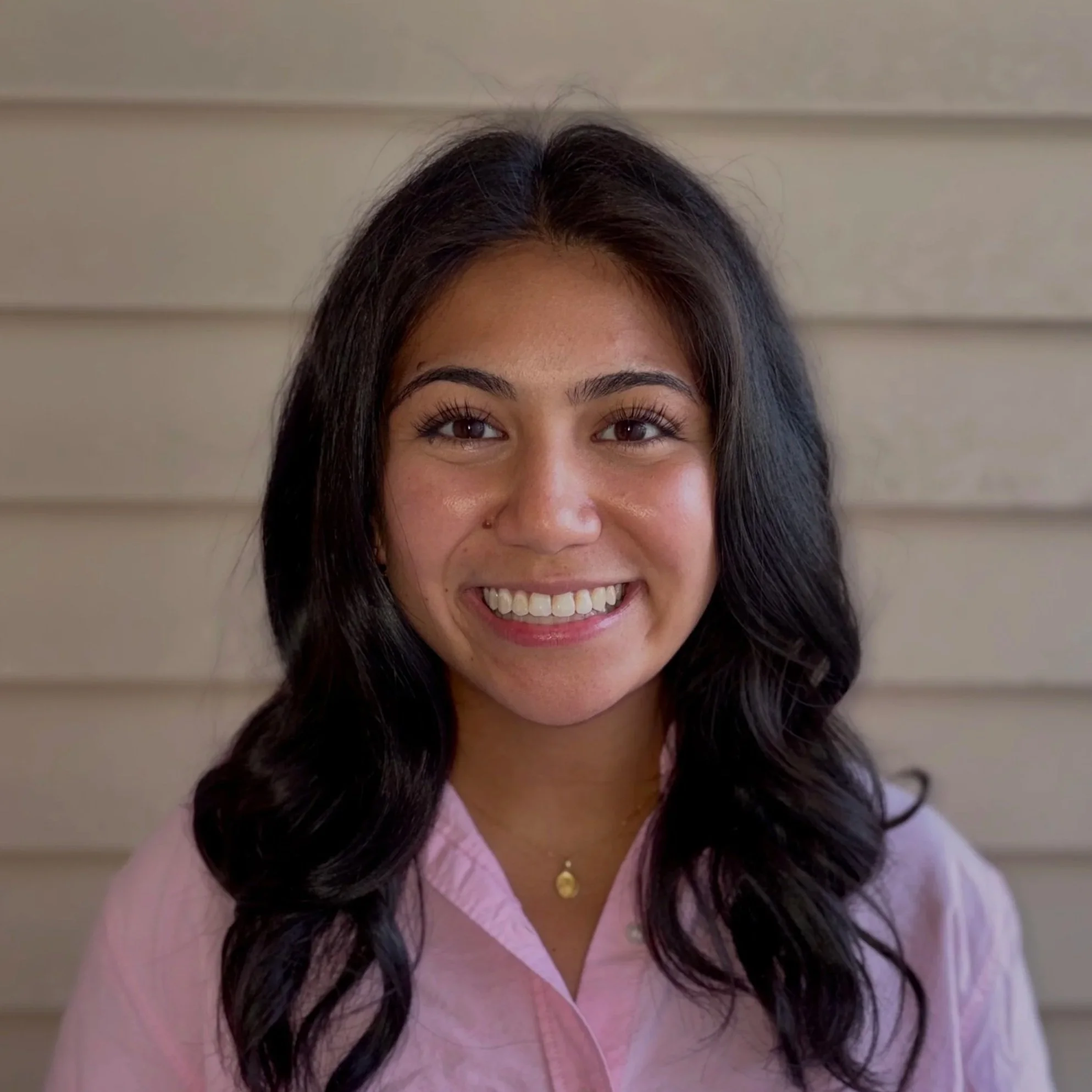 Photo of a young woman smiling