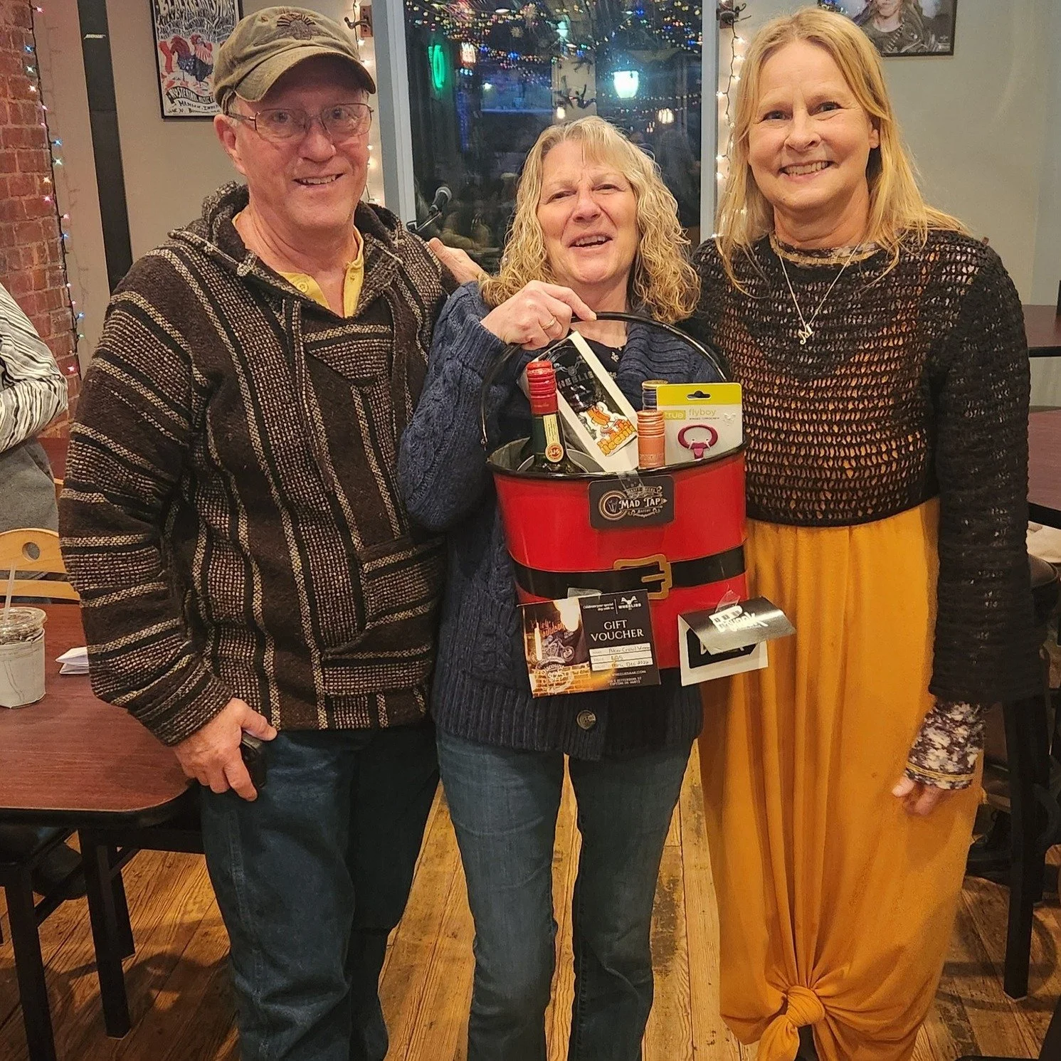 We have a winner!!! Or should we say the luckiet girl in the world?  Congratulations to Eva Whisler on winning the Downtown Tipton Poker Crawl with 2 pairs!  Thank you everyone for your generous donations to the prize basket!

Eva also won a 50"