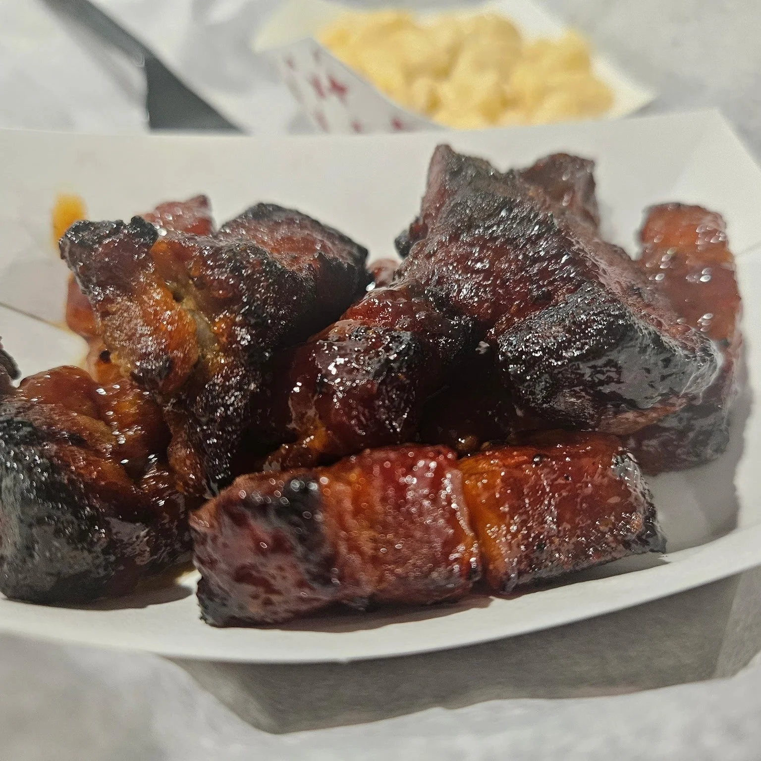 Weekly update on all the fun to be had at The Mad Tap!  First, and most importantly, the meat candy is back!  Yes, 🥓PORK BURNT ENDS🥓juicy, tender chunks of pork, crispy, buttery sweet, served with a side and cornbread!

🎤Open mic on Tuesday from 6