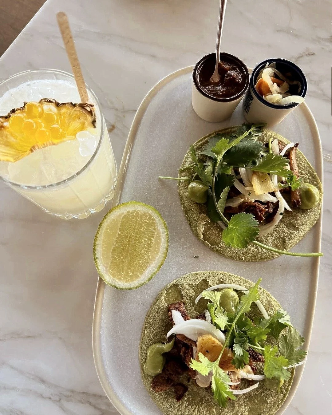 This is perfection layered into every bite. 🌮 

Achiote-marinated pork, roasted salsa roja, smoked flank steak, habanero chili tzatziki, and pickled fresnos come together in our Al Pastor. Best paired with a cocktail and enjoyed slowly.

📸: @alexam
