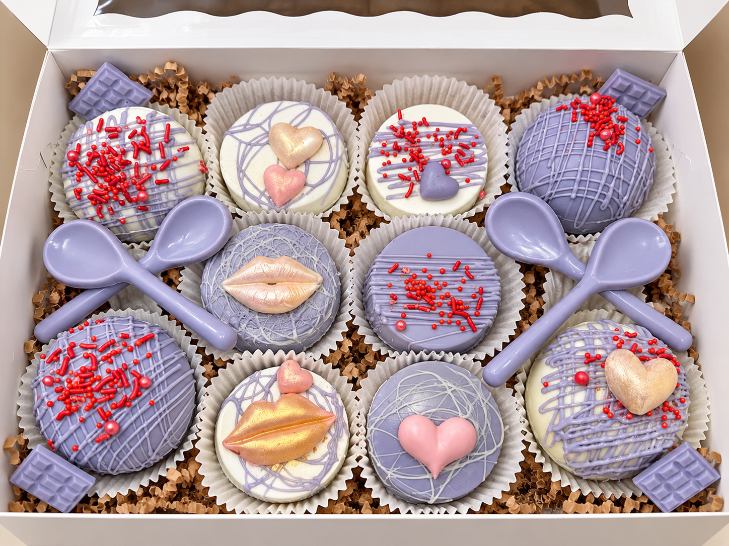 Lavender and white chocolate-dipped Oreos and Cocoa bombs decorated with elegant metallic accents