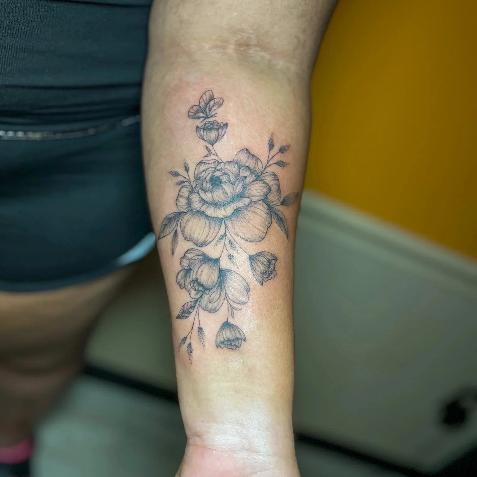 delicate floral tattoo by dulce at Ink Oasis in Wilmington Delaware.