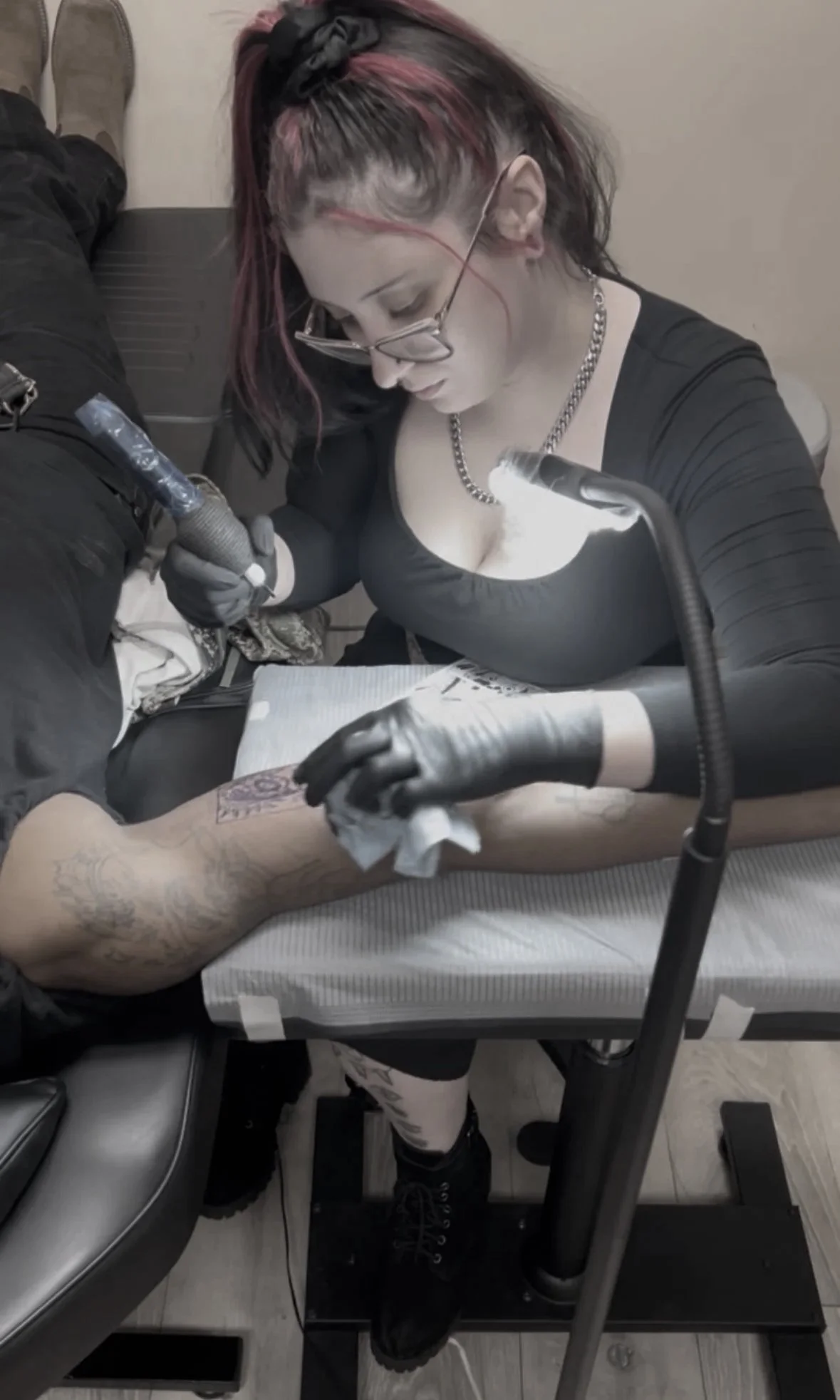 Jordan Schorah working on a tattoo in Wilmington Delaware