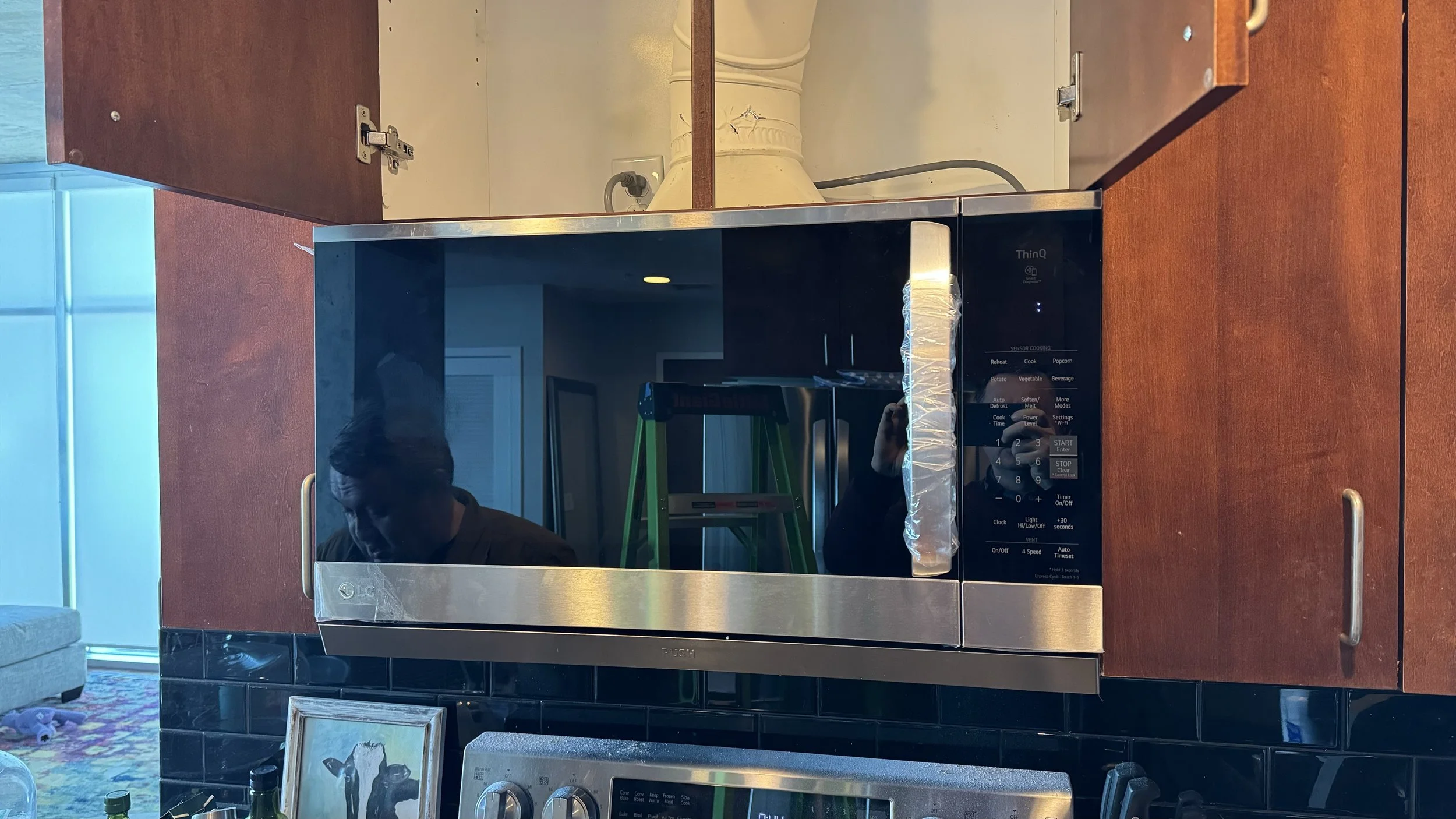 Denver Colorado Handyman Project Microwave Installation above stove