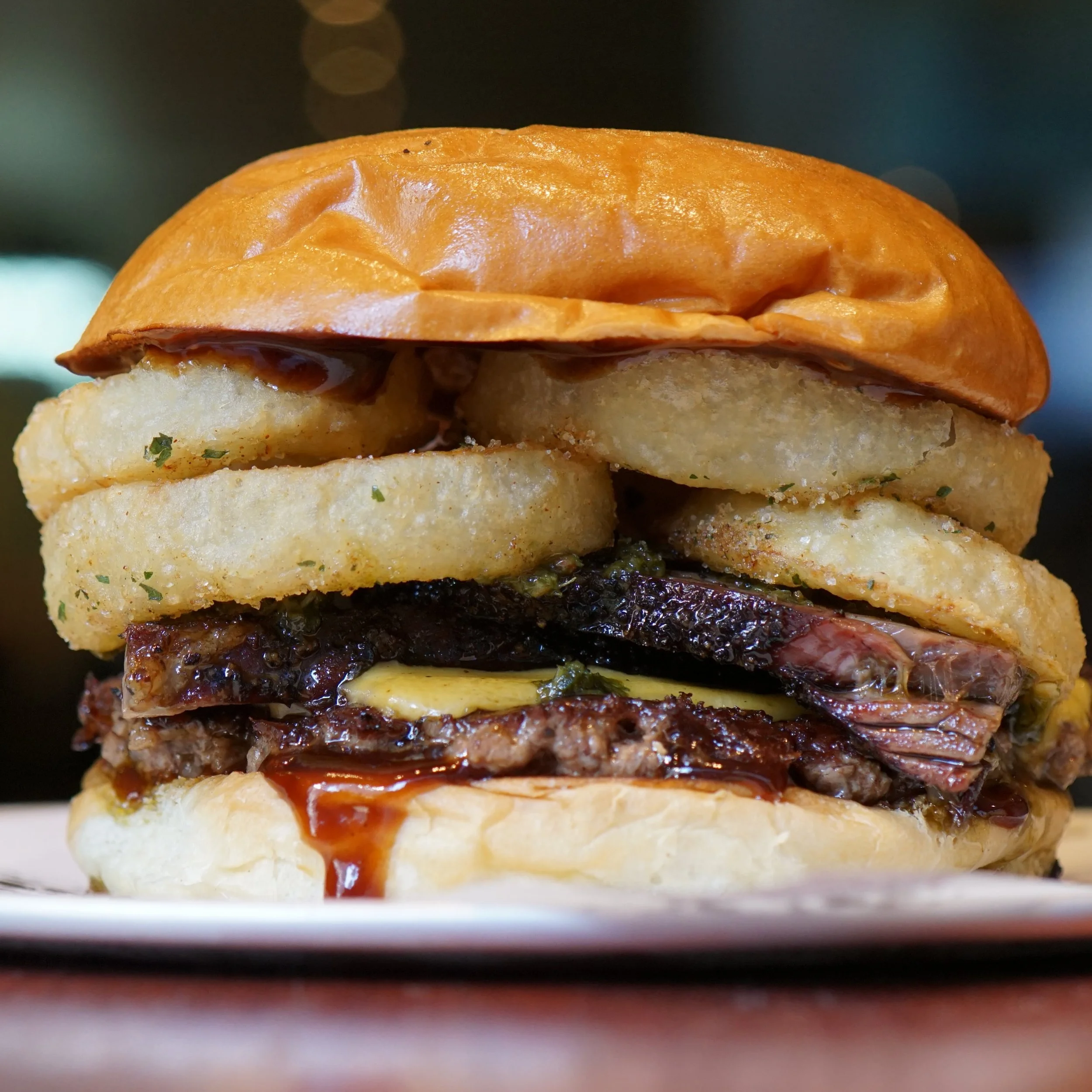 This weeks special!

🌶️ Chimi Hendrix 💨

🥩BL Beef Patty 
🧀American Cheese 
💨Smoked Beef Brisket 
🧅Onion Rings 
🌶️Chilli BBQ 
🌿Chimichurri 
🍔On a Milk Bun 
$24 

Available all this week at Bar Luca Sydney! 

We&rsquo;re open all from 11am til