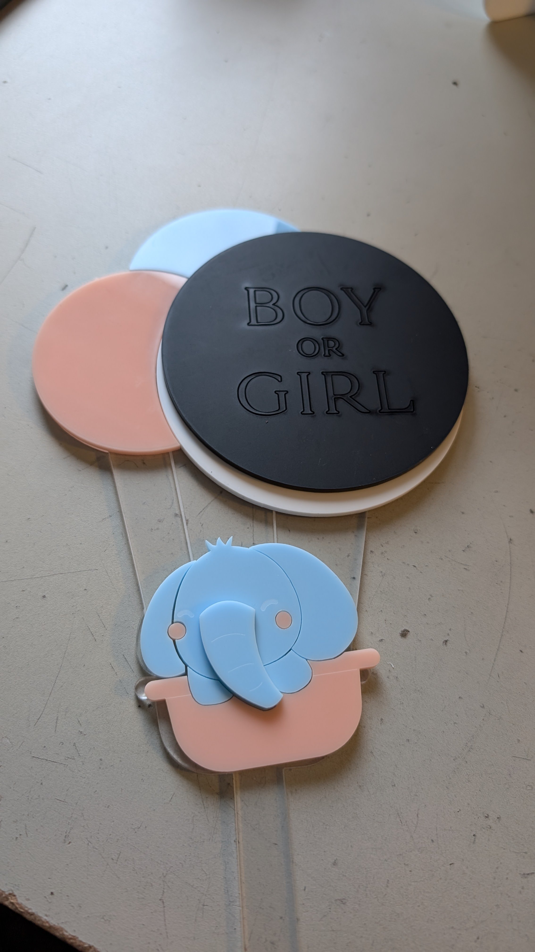 All the layers before assembling the baby elephant custom cake topper.