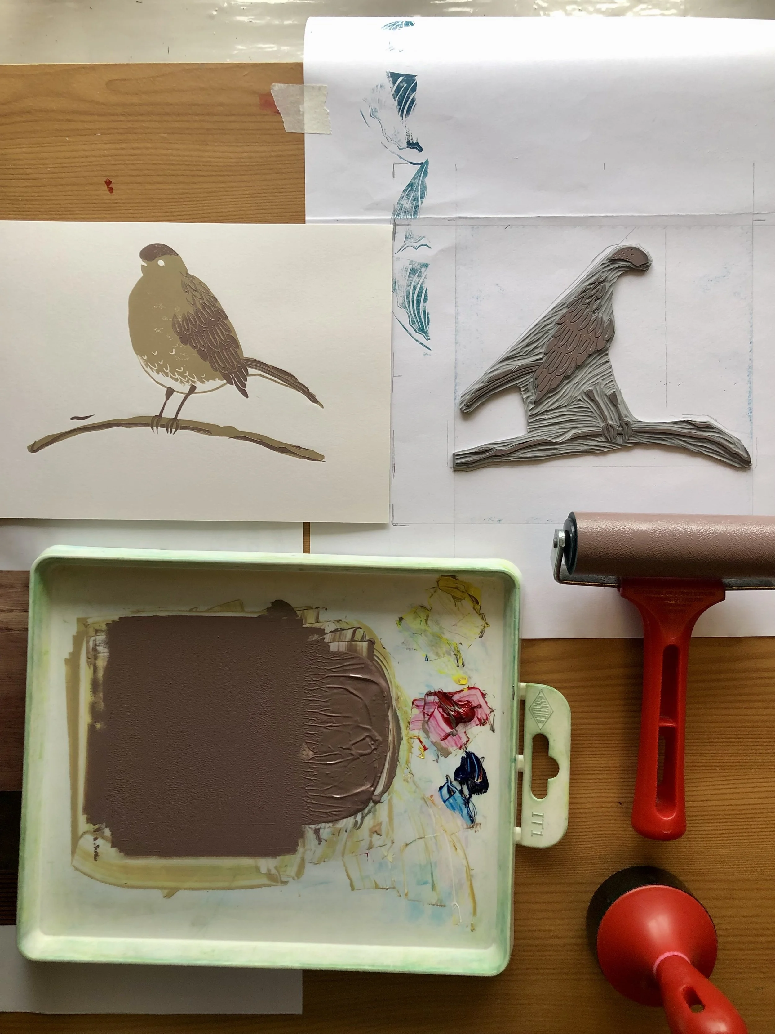 Robin and holly festive greeting cards. Digitally printed from my original linocut artwork, with layer two of the hand printing process shown here.