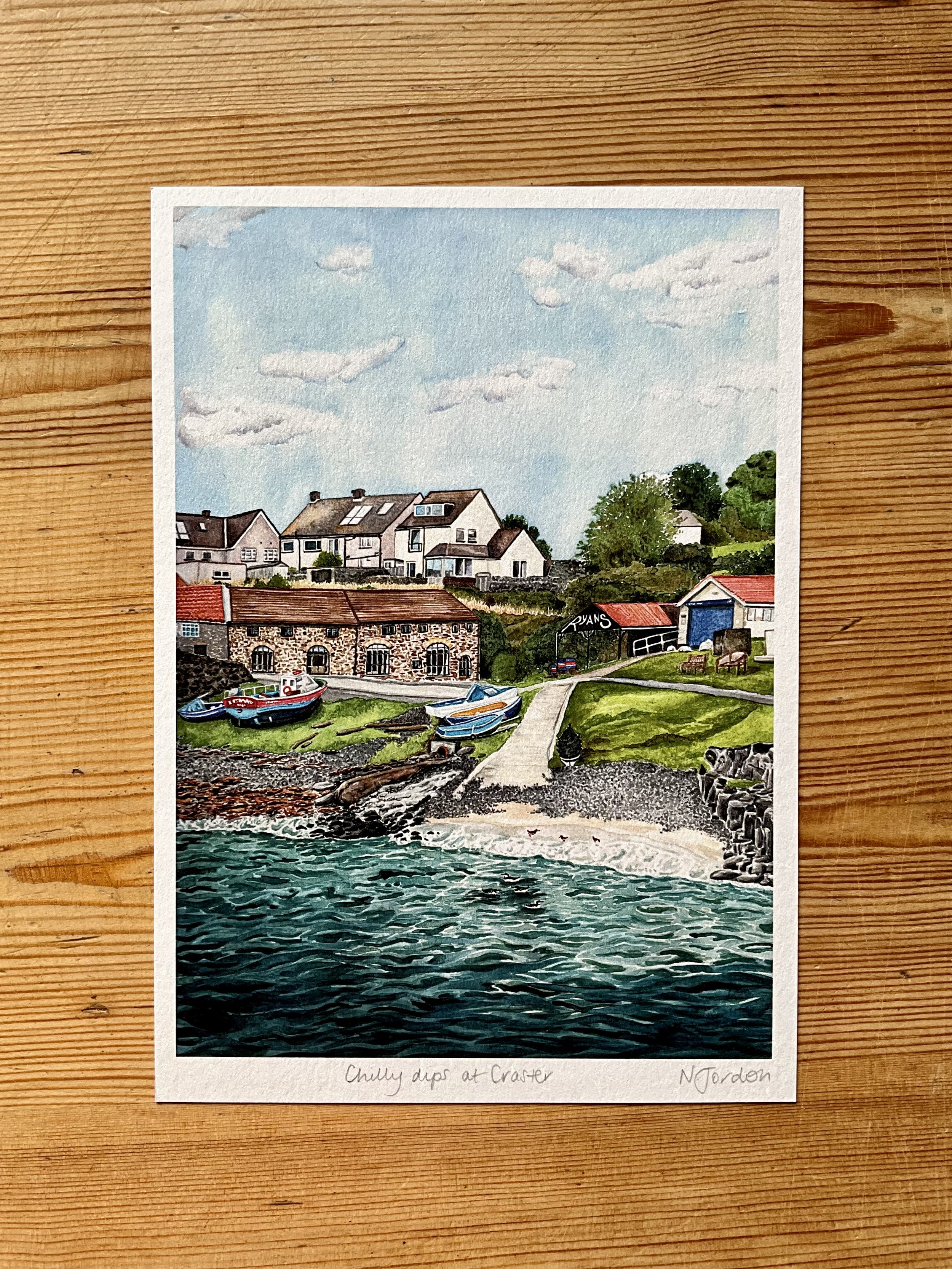 Art print of original A3 watercolour painting ‘Chilly dips at Craster’. A5 print is shown in this photo