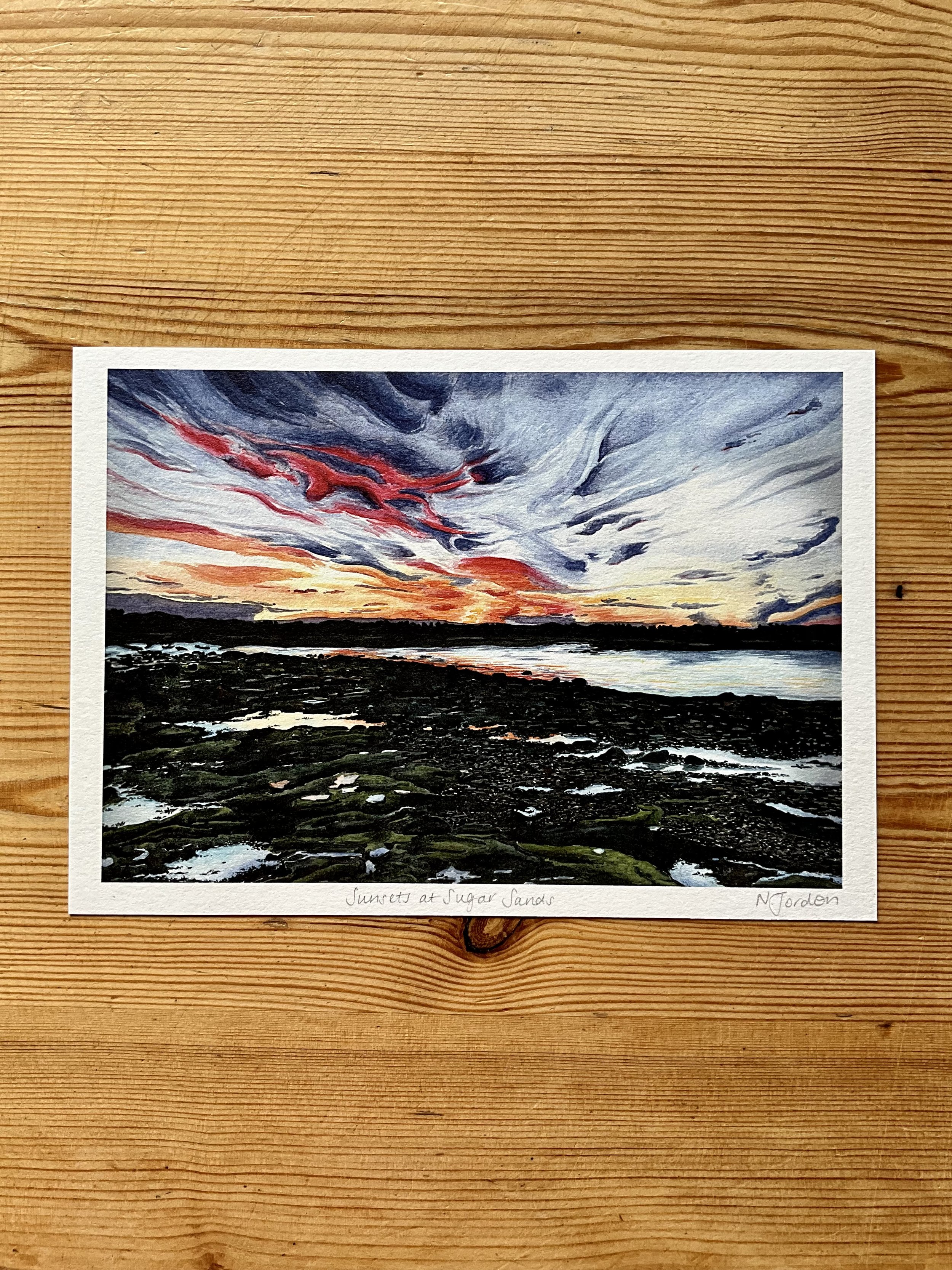 Art print of original A3 ‘Sunsets at Sugar Sands’ watercolour painting. Printed onto textured, off-white paper, these art prints are available in a range of sizes. A5 is shown in this photo