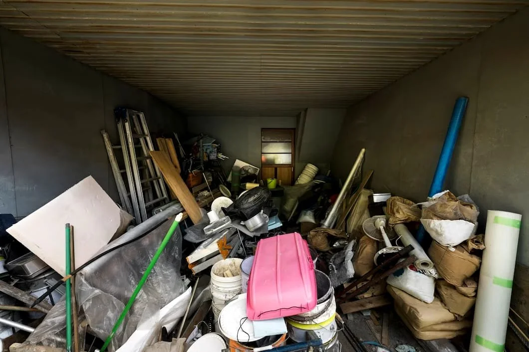 Garage filled with random assortment of rubbish
