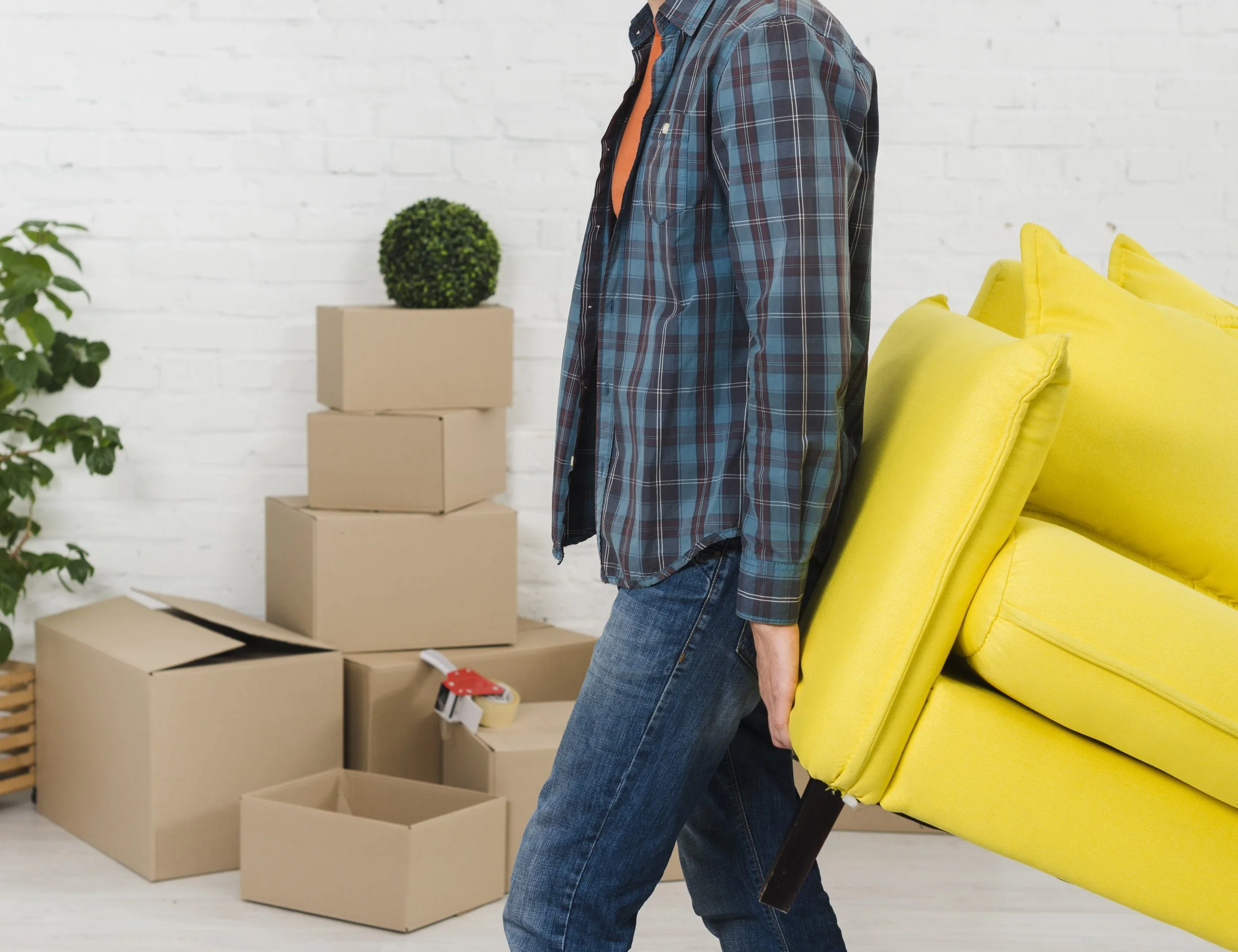Man carrying sofa