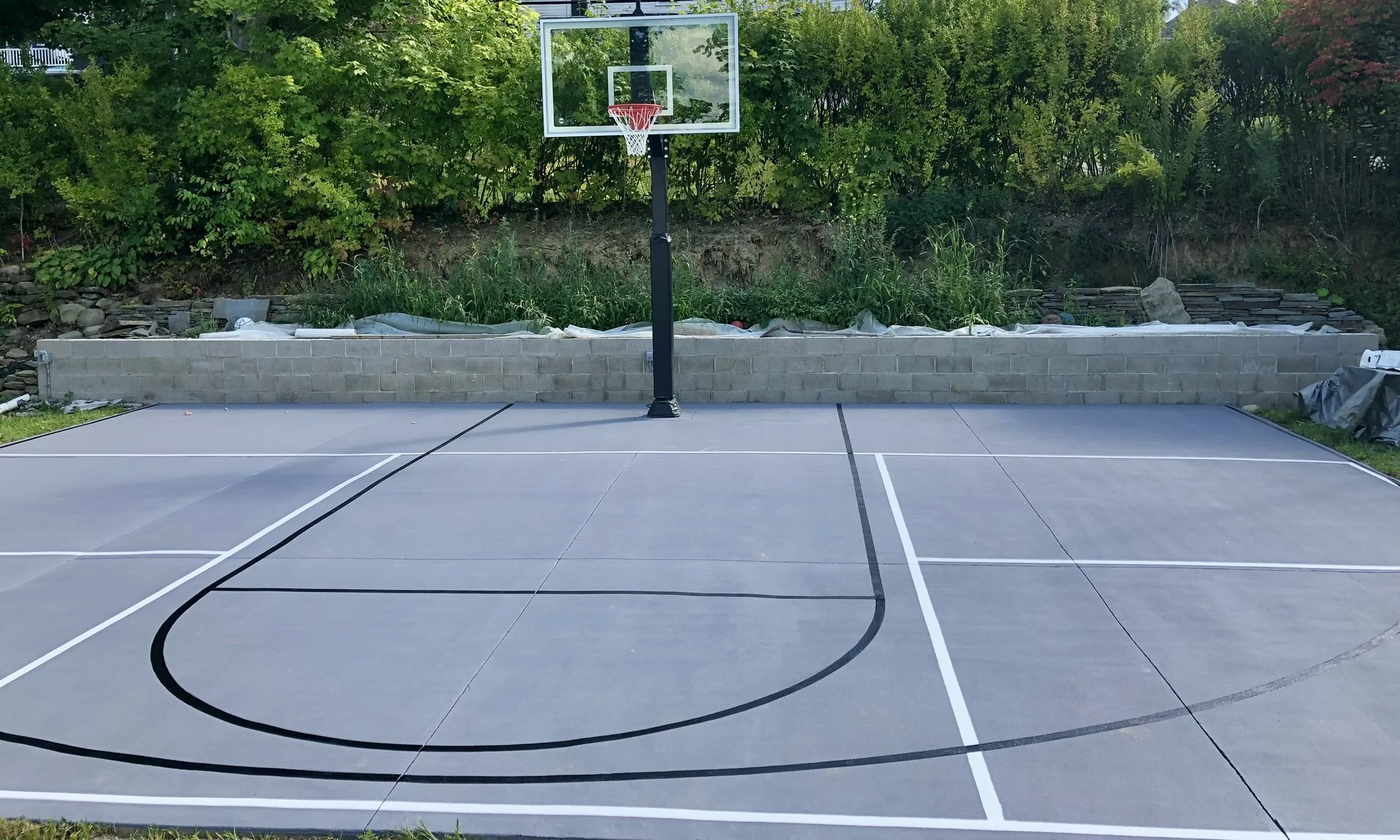 Outdoor basketball court with hoop