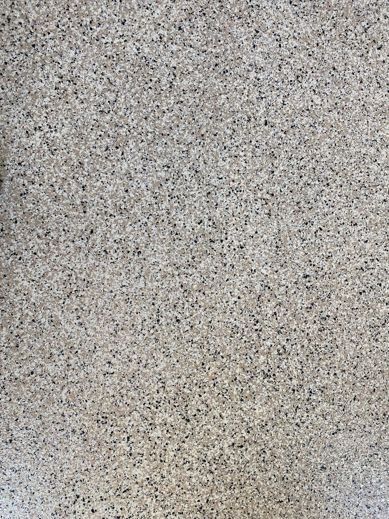 Textured surface with speckled pattern