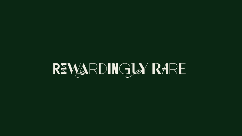 Text reads "REWARDING GUY RARE" on a dark green background.