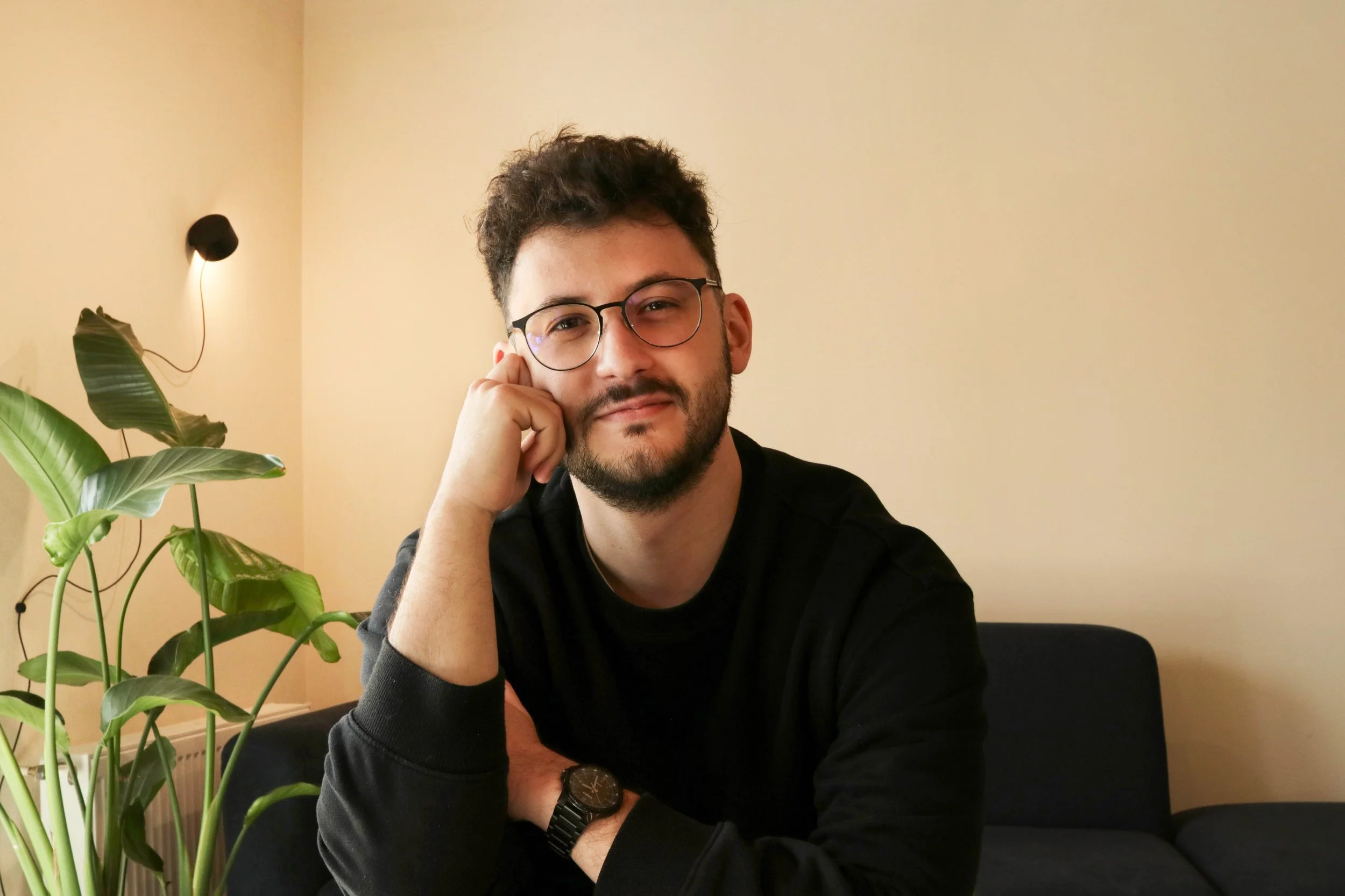 Portrait of NNFTM’s lead architect in a professional architecture studio