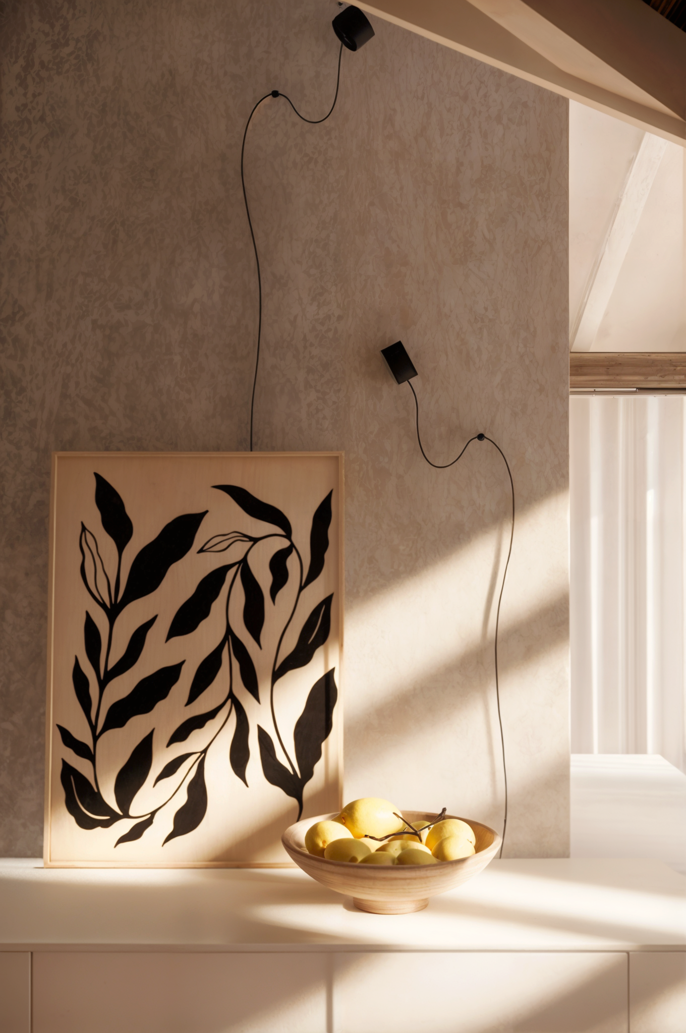 Modern multifunctional residential area created from a historic attic renovation, showcasing innovative interior design.