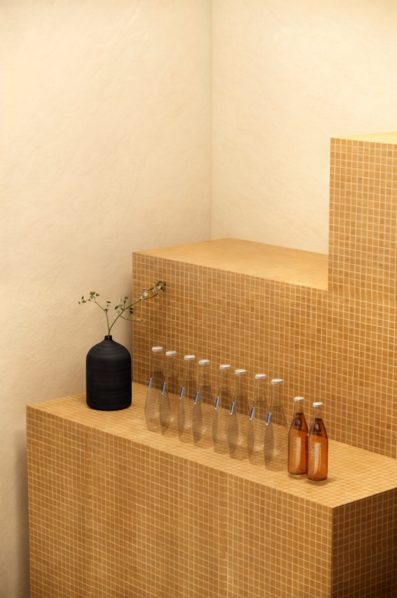 Transformed office space at Mapei Headquarters, featuring innovative relaxation areas and collaborative workspaces.