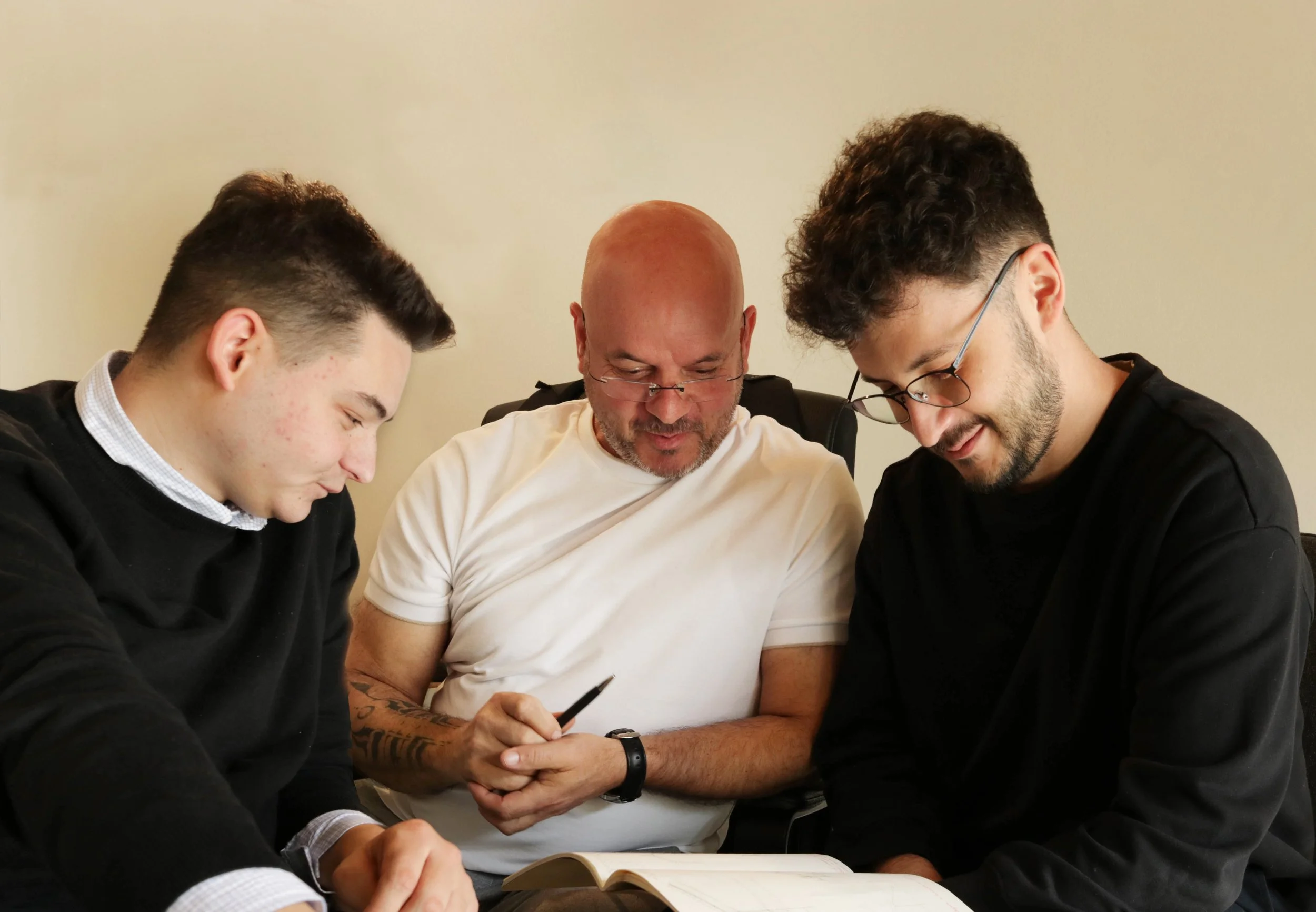 NNFTM architecture and interior design team collaborating in a modern studio workspace