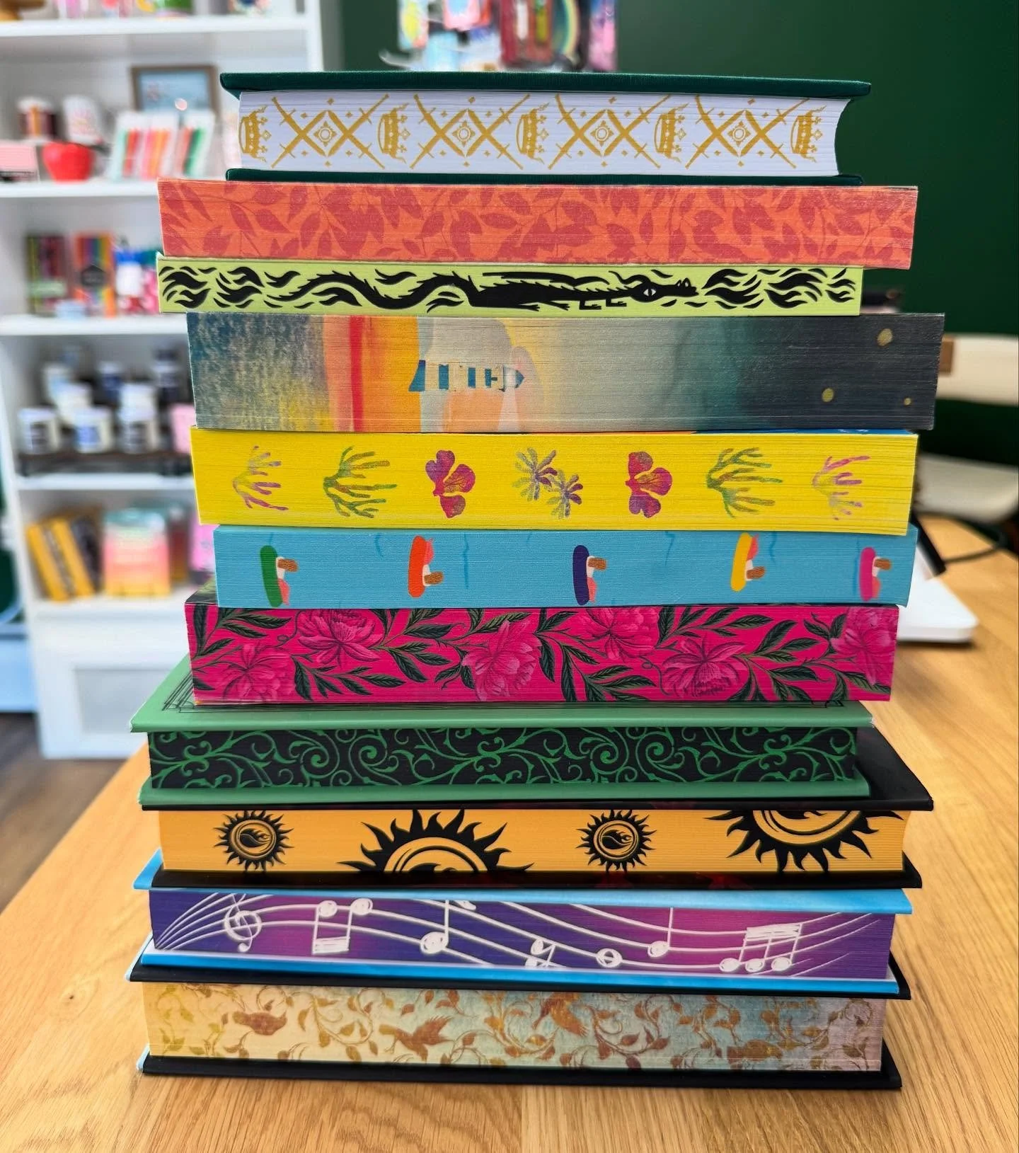 All these gorgeous books with stenciled pages edges present book collectors with a conundrum: do you face them spine out or pages out on your shelves? Spine out makes the most sense, but the art is too cool to not be seen!