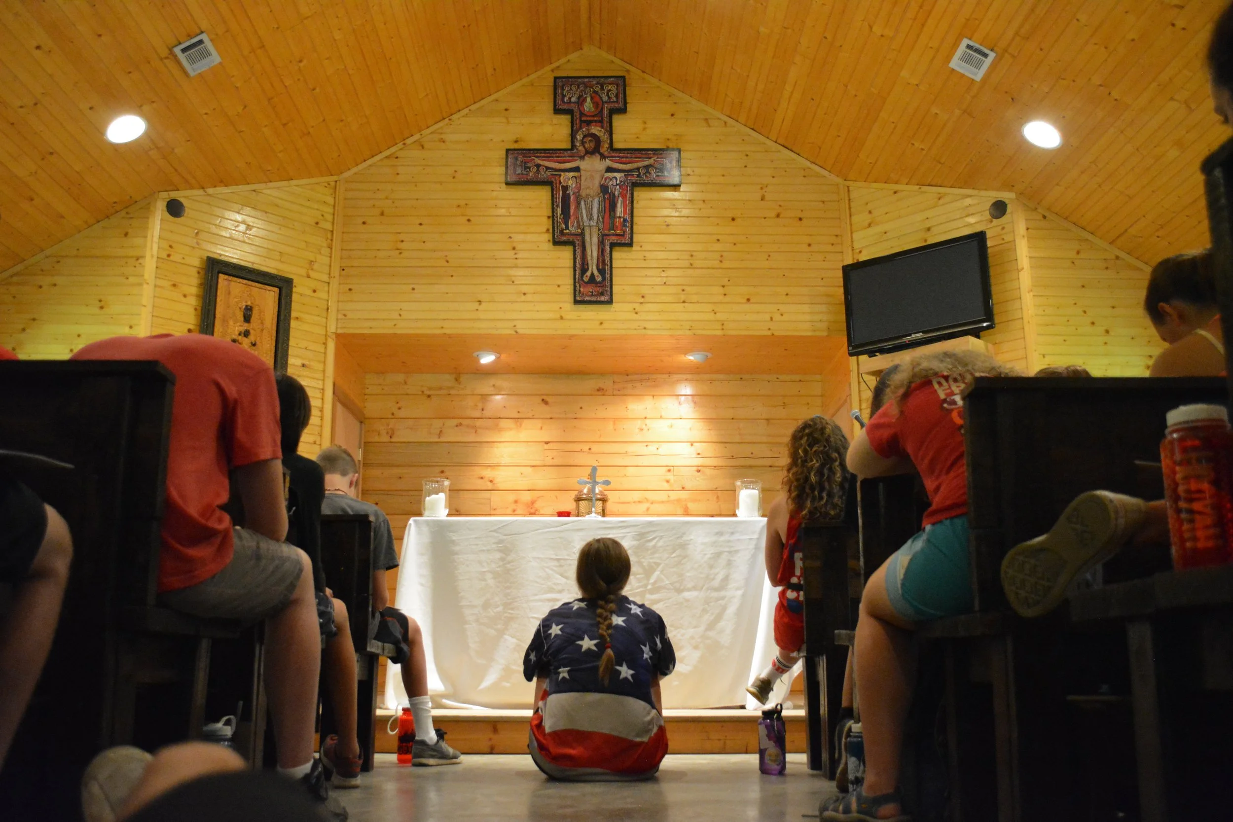Staff sitting in chapel