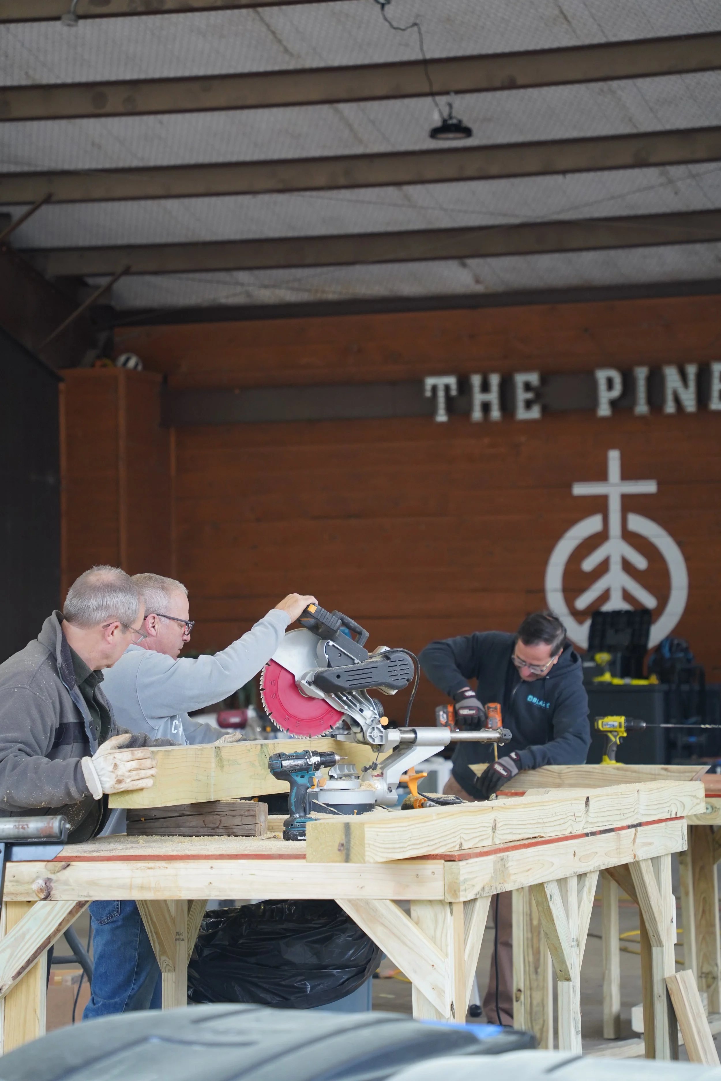 men building structure frame