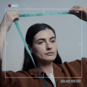 Measuring head circumference to determine the correct hat size.