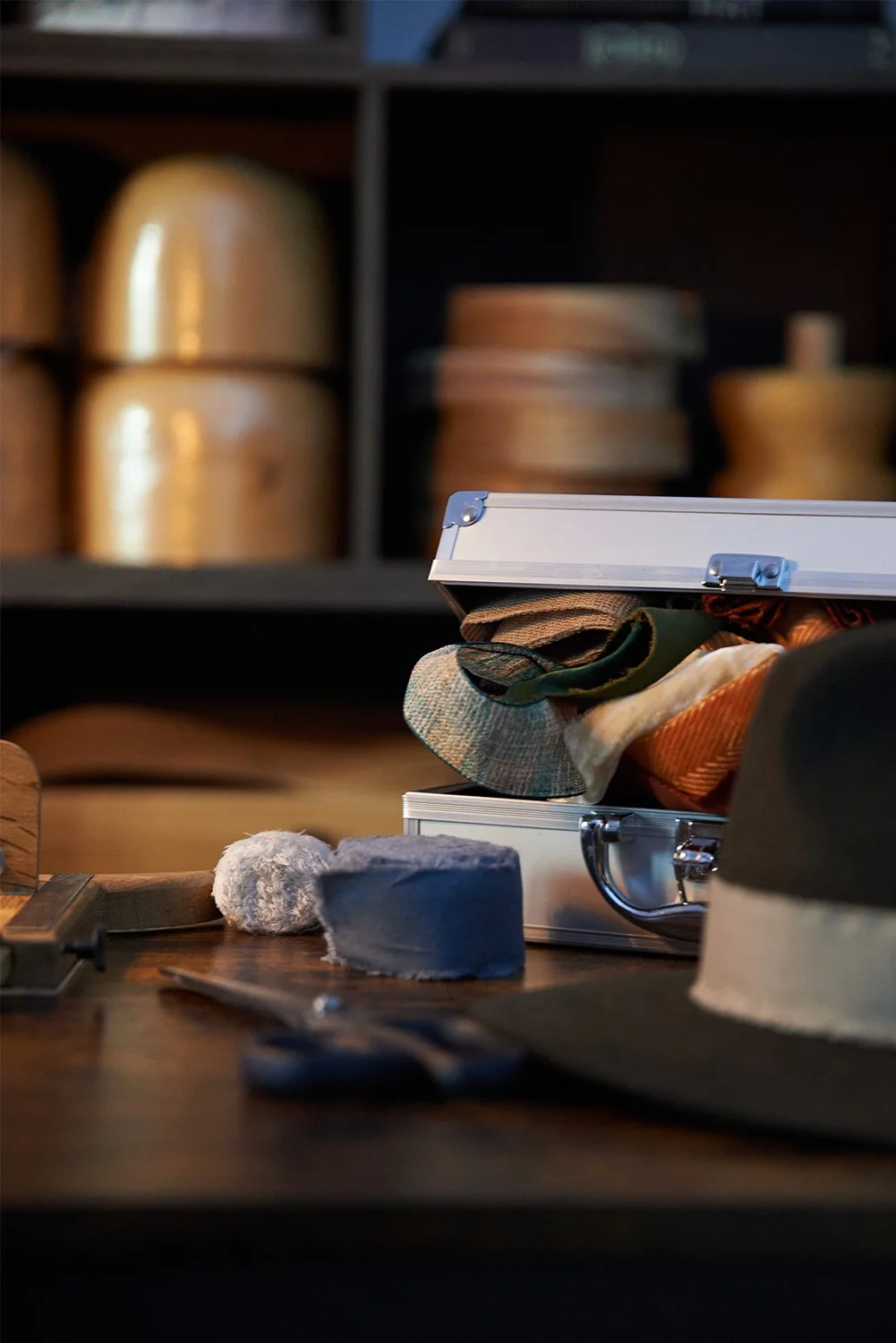 Selection of handmade hats displayed together in the studio.