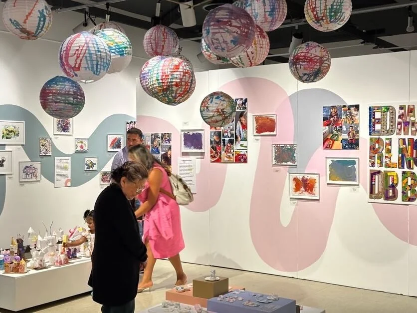 Visitors viewing collection