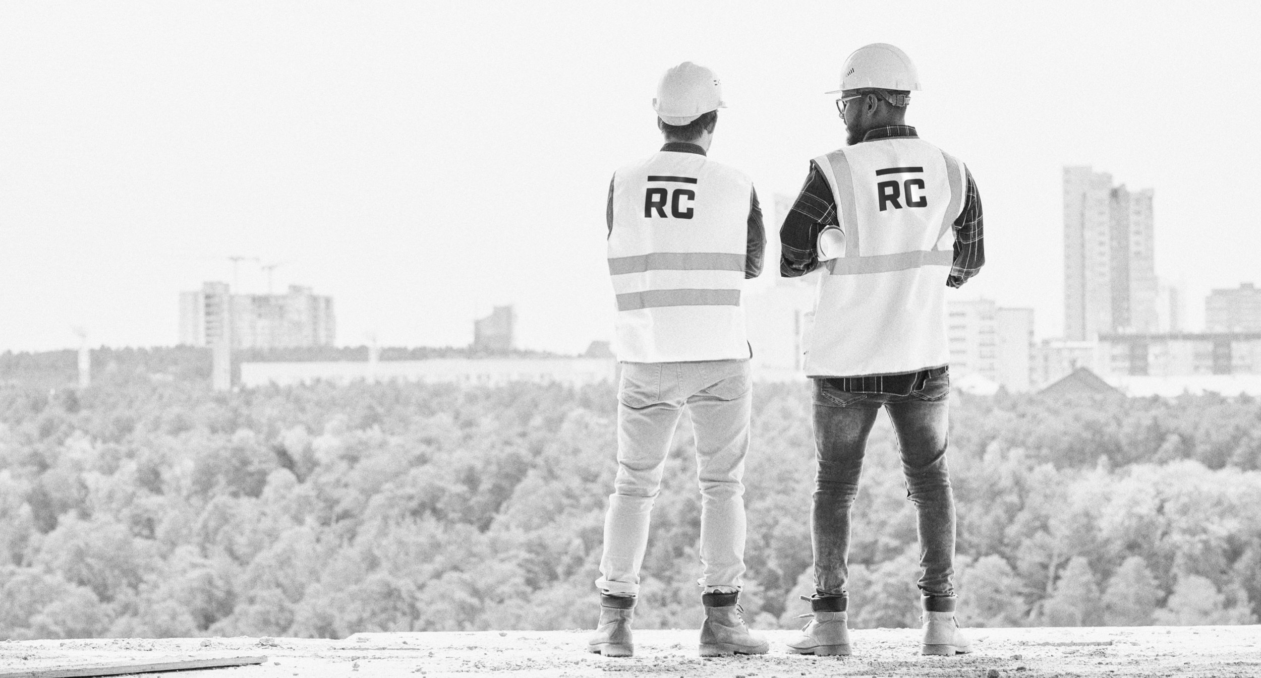 Construction workers standing on roof