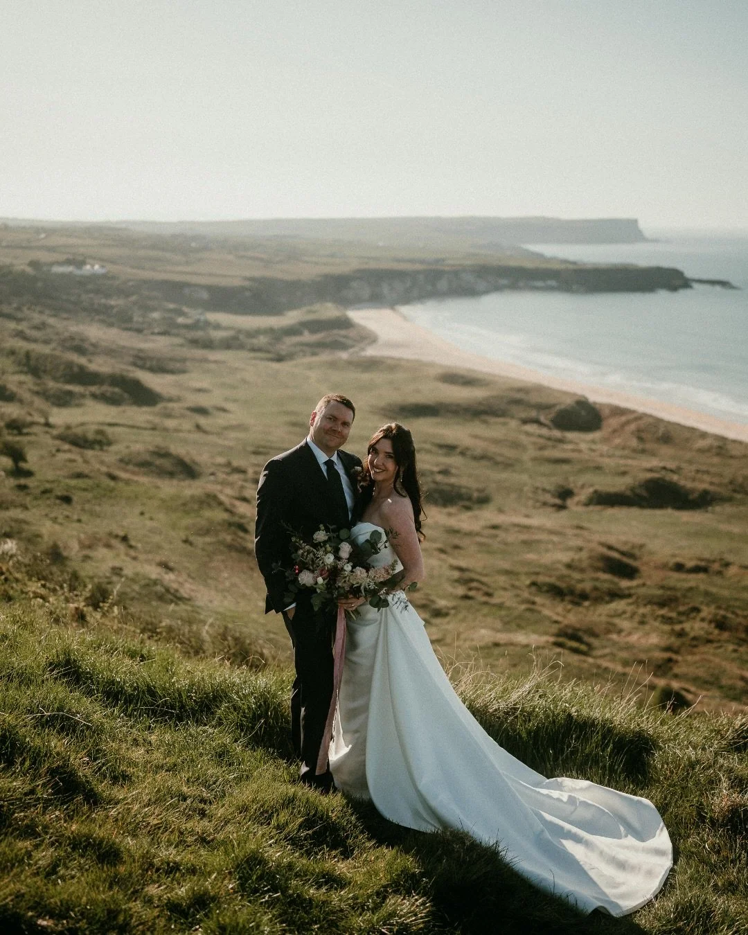 This bridal look and this gallery is absolutely mesmerizing. Our bride Elizabeth is wowing us in the Loren gown with the Loren Overskirt by @houseofrenhue with a custom off the shoulder strap.

A sleek column silhouette designed to turn heads! The he